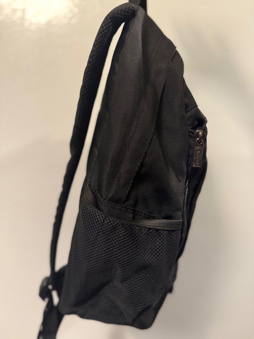 Reebok Black Backpack (Category: Backpacks) located in Quezon City. Submitted by smt00 (Listing ID 1417840500, Image 2). Description: - Side mesh pockets - Front zippered pocket - Yellow interior lining - Additional interior pockets .