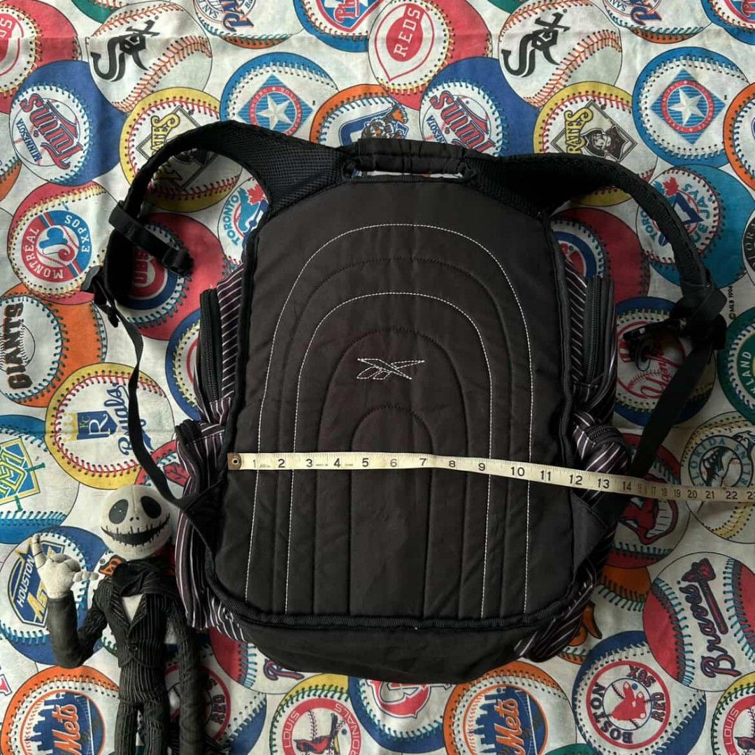 Reebok Striped Backpack multi Pockets (Category: Backpacks) located in Naga. Submitted by ErbsXBudolstuff (Listing ID 1417911185, Image 2). Description: Dm Php 880 Reebok multi Pockets Backpack Length 16 inc Width 12 inc 8 pockets Very good condition Small stain paint No Fade No Hole Zipper buckle's working.