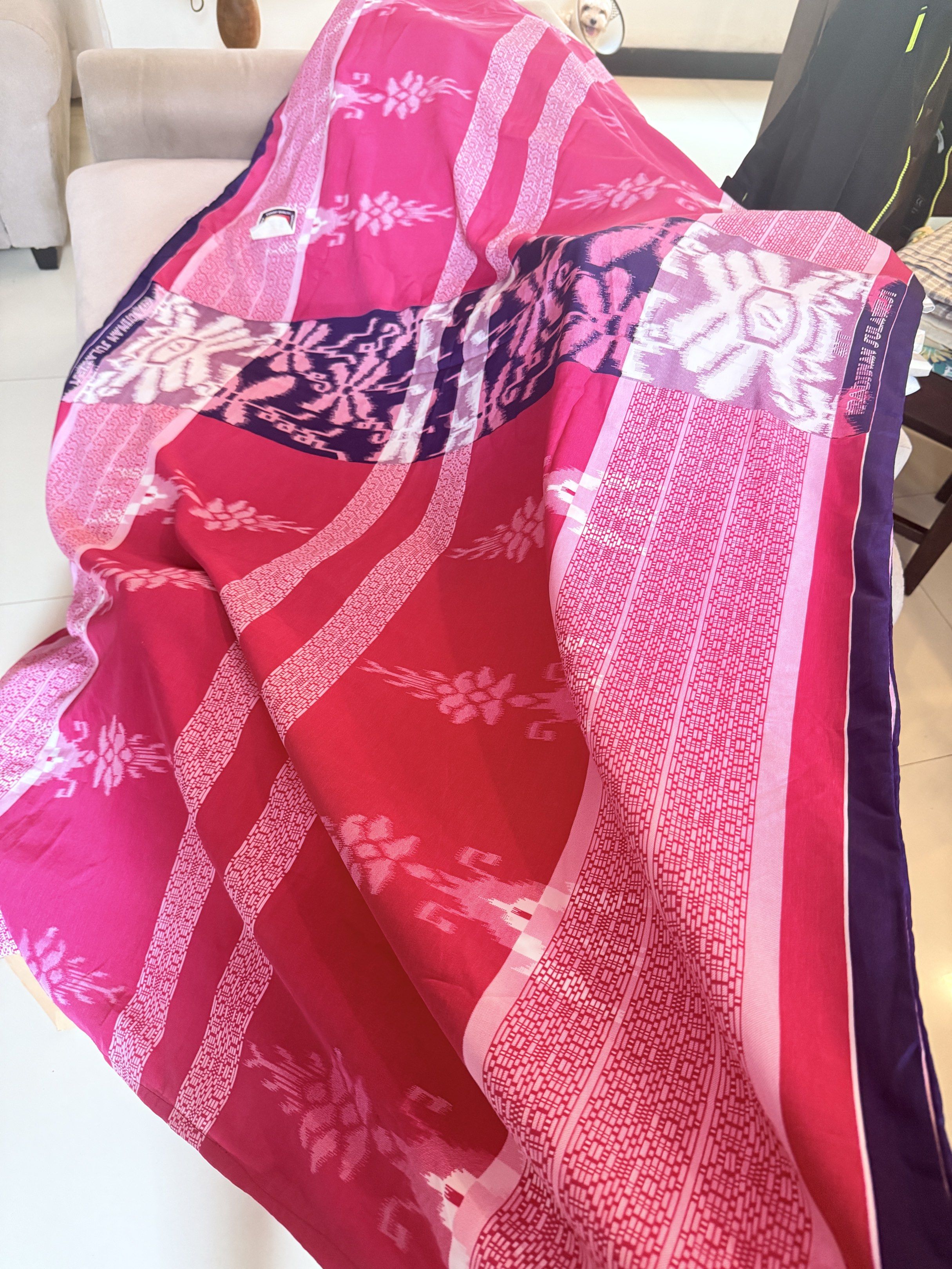 Sarung Tenun Bola 5000 Benang (Category: Skirts) located in Manila. Submitted by clutterfree.issa (Listing ID 1417833273, Image 2). Description: - Authentic Sarung Tenun Bola from Indonesia. - Eye-catching pink and red color scheme. - Features intricate woven patterns. - Marked as export quality. - High-quality fabric with a 5000 benang count. - Ideal for beachwear, casual wear, and more..