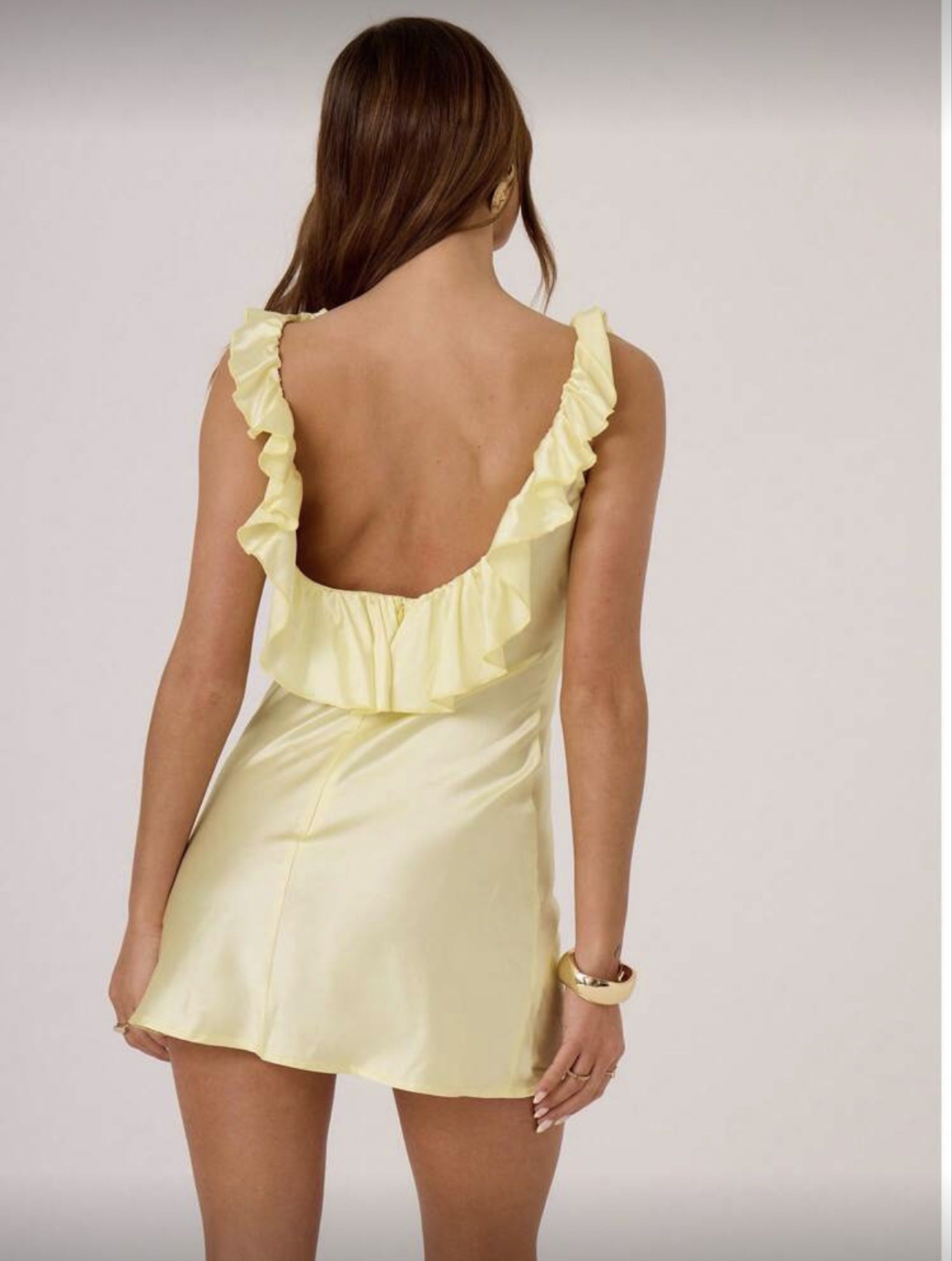 Shein Yellow Ruffle Mini Dress (Category: Dresses) located in San Fernando. Submitted by sandyayvii (Listing ID 1417885025, Image 2). Description: yellow ruffle mini dress XS on tag (used once only).