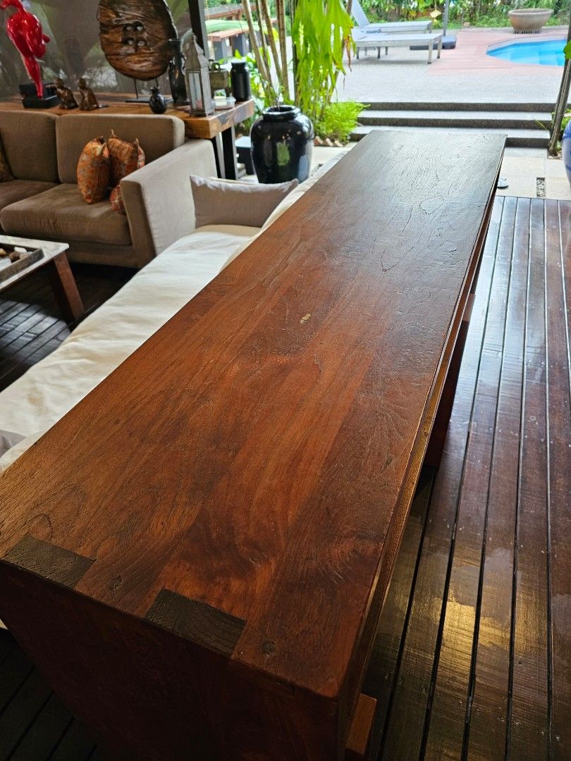 Solid teak sideboard / console (Category: Shelves, Cabinets & Racks) located in Singapore. Submitted by dacefish (Listing ID 1417813472, Image 2). Description: Handmade recycled teak sideboard. No screws/nails. 160x40 cm. Height 110 cm. Only $280 fixed price. Self collect from Seletar area..
