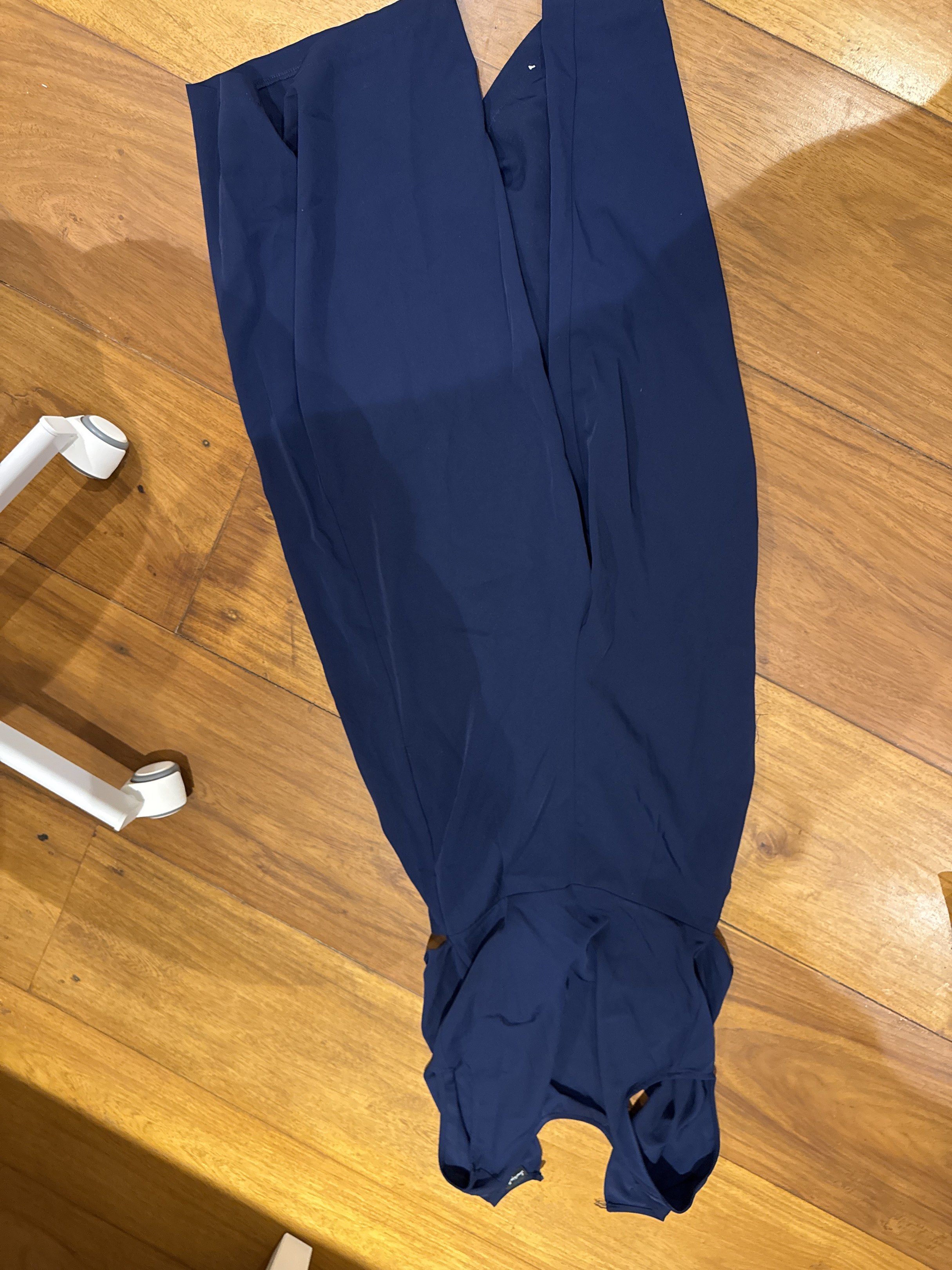 Something Borrowed Navy Jumpsuit - Size S (Category: Jumpsuits) located in Manila. Submitted by eb.declutters (Listing ID 1417956222, Image 3). Description: - Something Borrowed navy jumpsuit - Size: Small - Features: - Halter neckline - Cutout back - Tie-waist detail - Wide-leg design - Perfect for: Night out or special occasion - Fabric: Flowy, lightweight.