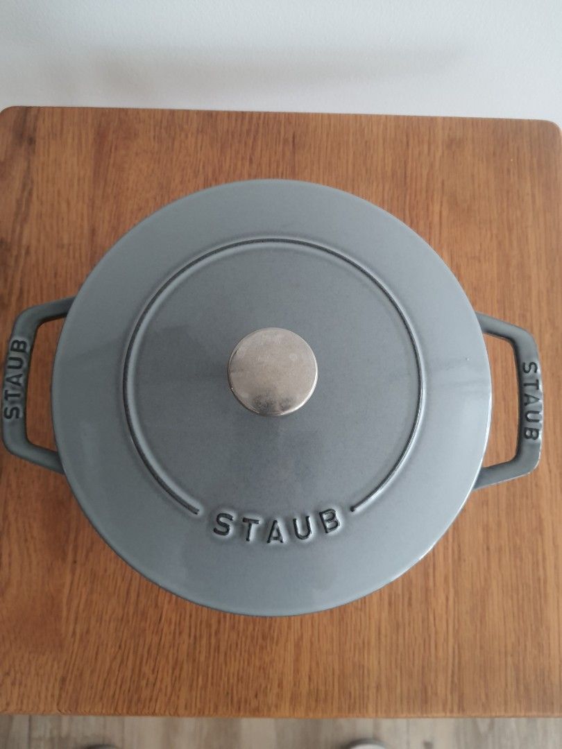 Staub 20cm Round Cocotte Gohan (Category: Cookware & Accessories) located in Mandaluyong City. Submitted by shark198 (Listing ID 1417813346, Image 2). Description: - Staub 20cm Round Cocotte Gohan pot - Elegant grey exterior - Durable black interior - Staub logo embossed on lid - Staub branding on handles - Authentic 'Made in France' craftsmanship used only few times so it is in almost perfect condition bought it from Japan amazon. it is designed