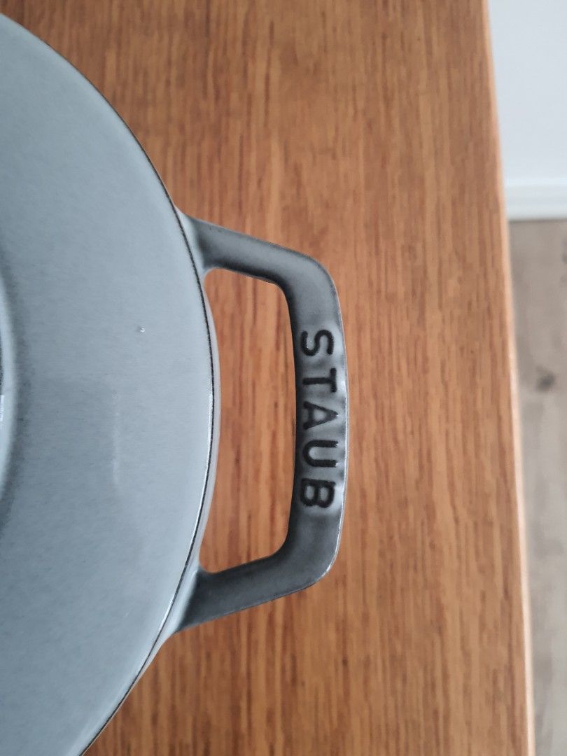 Staub 20cm Round Cocotte Gohan (Category: Cookware & Accessories) located in Mandaluyong City. Submitted by shark198 (Listing ID 1417813346, Image 3). Description: - Staub 20cm Round Cocotte Gohan pot - Elegant grey exterior - Durable black interior - Staub logo embossed on lid - Staub branding on handles - Authentic 'Made in France' craftsmanship used only few times so it is in almost perfect condition bought it from Japan amazon. it is designed
