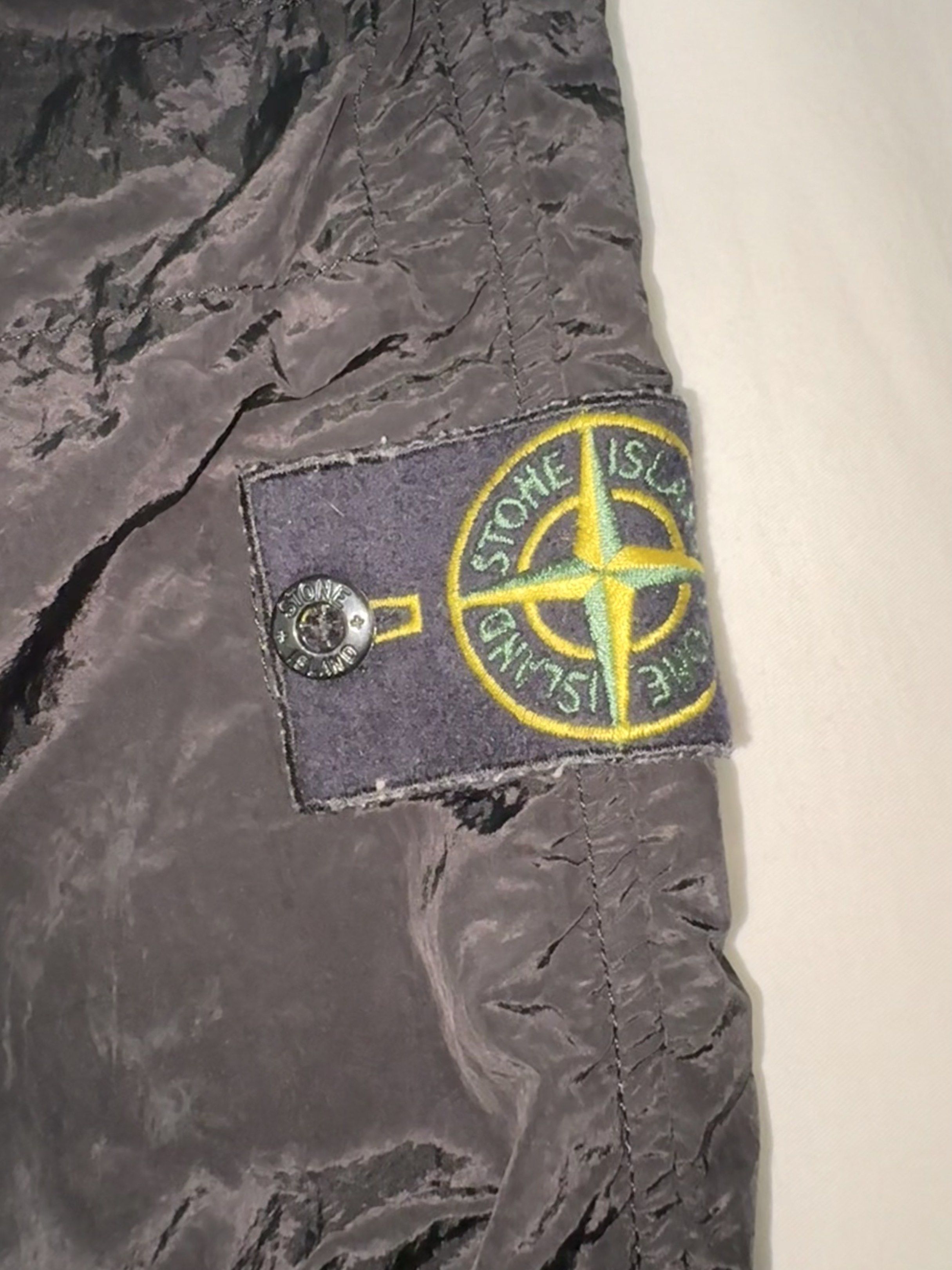 Stone Island Black Nylon Pants (Category: Trousers) located in Taguig. Submitted by homieplugph (Listing ID 1417996145, Image 2). Description: - Authentic Stone Island black nylon pants - Iconic Stone Island badge - Drawstring waist - Zippered pockets - Includes authentication tag with QR code - Made in Tunisia - Bought in Farfetch.
