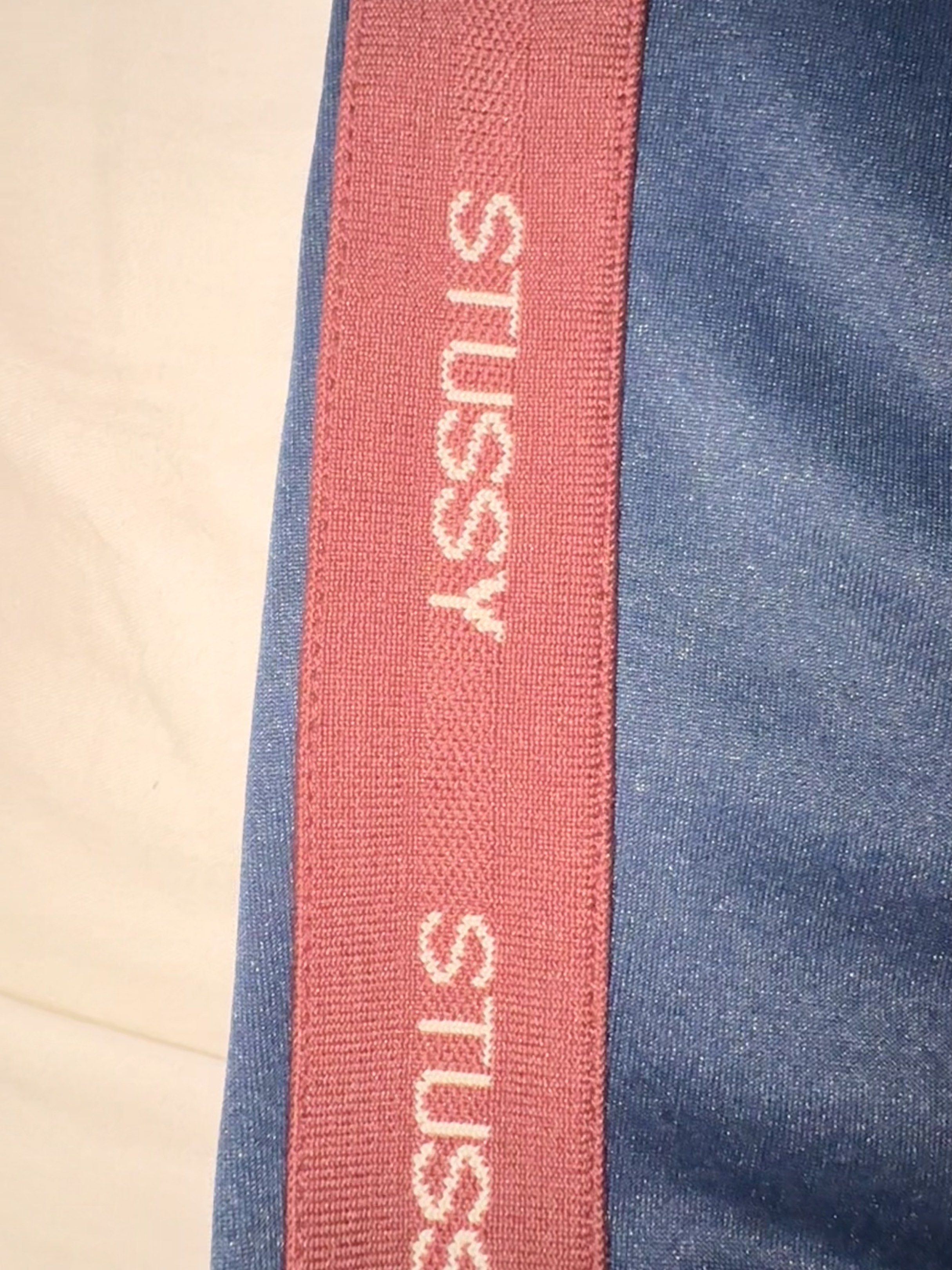 Stussy Track Pants - Navy Blue (Category: Joggers) located in Taguig. Submitted by homieplugph (Listing ID 1417996111, Image 3). Description: - Stussy track pants - Color: Navy blue with maroon side stripe - Features Stussy logo - Size: Medium - Elastic waistband with drawstring - Made in China - Authentic.