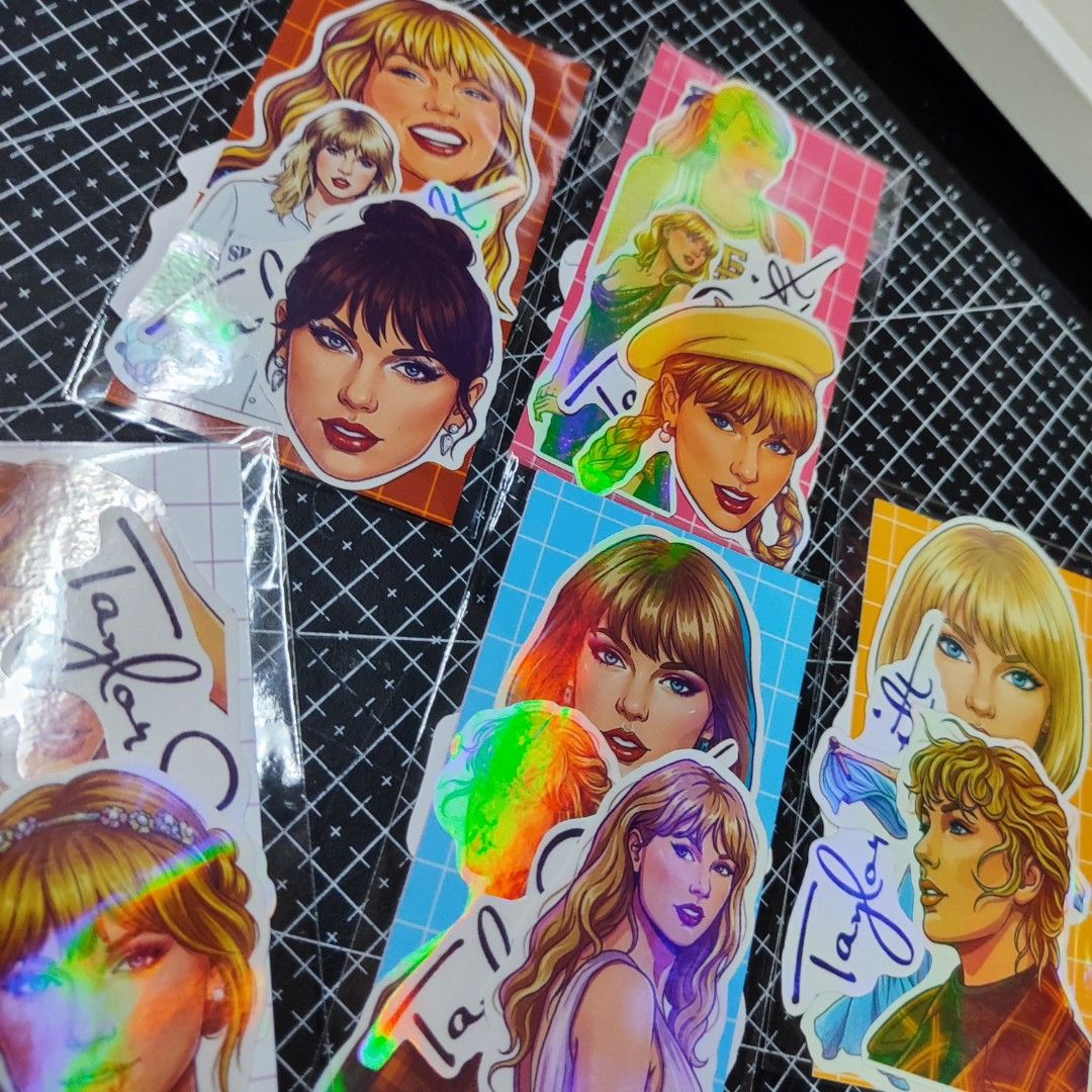 Taylor Swift Stickers (Category: Western Merchandise) located in Bulacan. Submitted by somethingblue02 (Listing ID 1417889543, Image 1). Description: - Taylor Swift sticker set - Features various designs and eras - Individually packaged - Includes images of Taylor Swift - Stickers have a holographic effect - Perfect for notebooks, journaling, calendars. - These are regular stickers onlyyy.