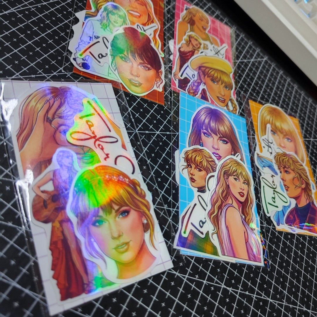 Taylor Swift Stickers (Category: Western Merchandise) located in Bulacan. Submitted by somethingblue02 (Listing ID 1417889543, Image 3). Description: - Taylor Swift sticker set - Features various designs and eras - Individually packaged - Includes images of Taylor Swift - Stickers have a holographic effect - Perfect for notebooks, journaling, calendars. - These are regular stickers onlyyy.