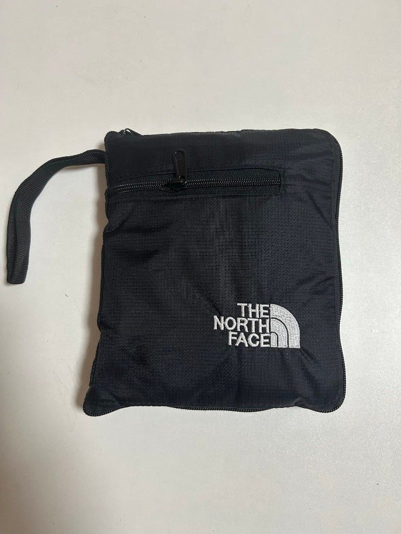 The North Face Packable Duffle Bag (Category: Backpacks) located in Balanga. Submitted by bltzkrg0 (Listing ID 1417933168, Image 3). Description: - The North Face duffle bag - Packable design with included storage pouch - Colors available: Black , Dark Gray & Gray - Features: - Main compartment - Two front pockets - Shoulder strap - North Face logo on the front - Folds for compact storage and travel.