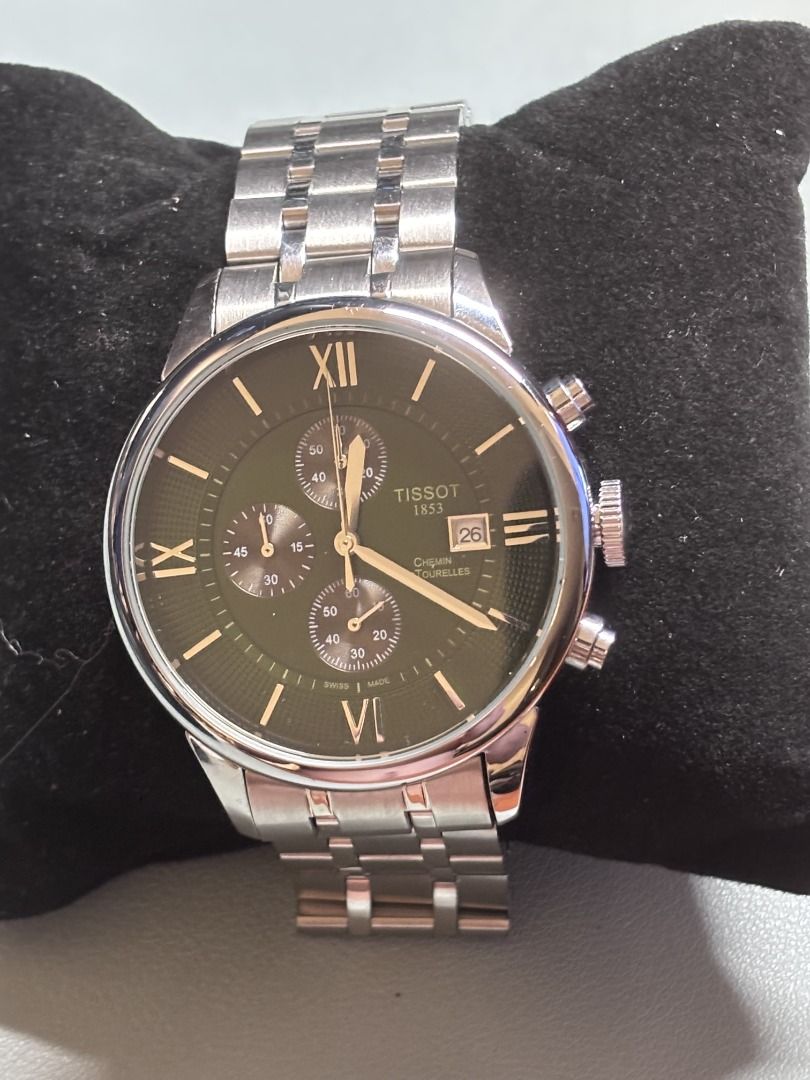 Tissot Chemin Des Tourelles Chronograph (Category: Luxury Watches) located in Makati City. Submitted by safefire-d3b0b8 (Listing ID 1417862537, Image 3). Description: - Tissot watch with a striking green dial - Features chronograph subdials and a date display - Durable stainless steel case and bracelet - Water-resistant design - Scratch-resistant sapphire crystal - Model number: T099.407 - Includes original box Sold as is where is The Chemin Des 