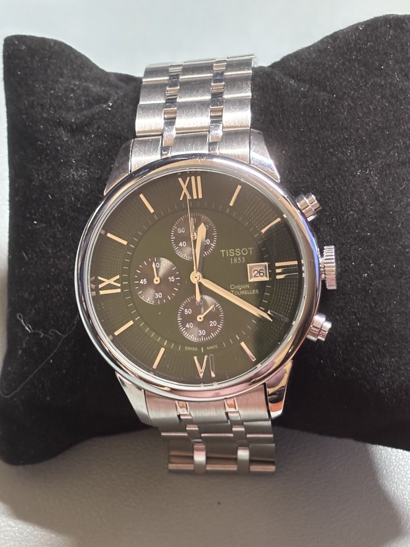 Tissot Chemin Des Tourelles Chronograph (Category: Luxury Watches) located in Makati City. Submitted by safefire-d3b0b8 (Listing ID 1417862537, Image 2). Description: - Tissot watch with a striking green dial - Features chronograph subdials and a date display - Durable stainless steel case and bracelet - Water-resistant design - Scratch-resistant sapphire crystal - Model number: T099.407 - Includes original box Sold as is where is The Chemin Des 