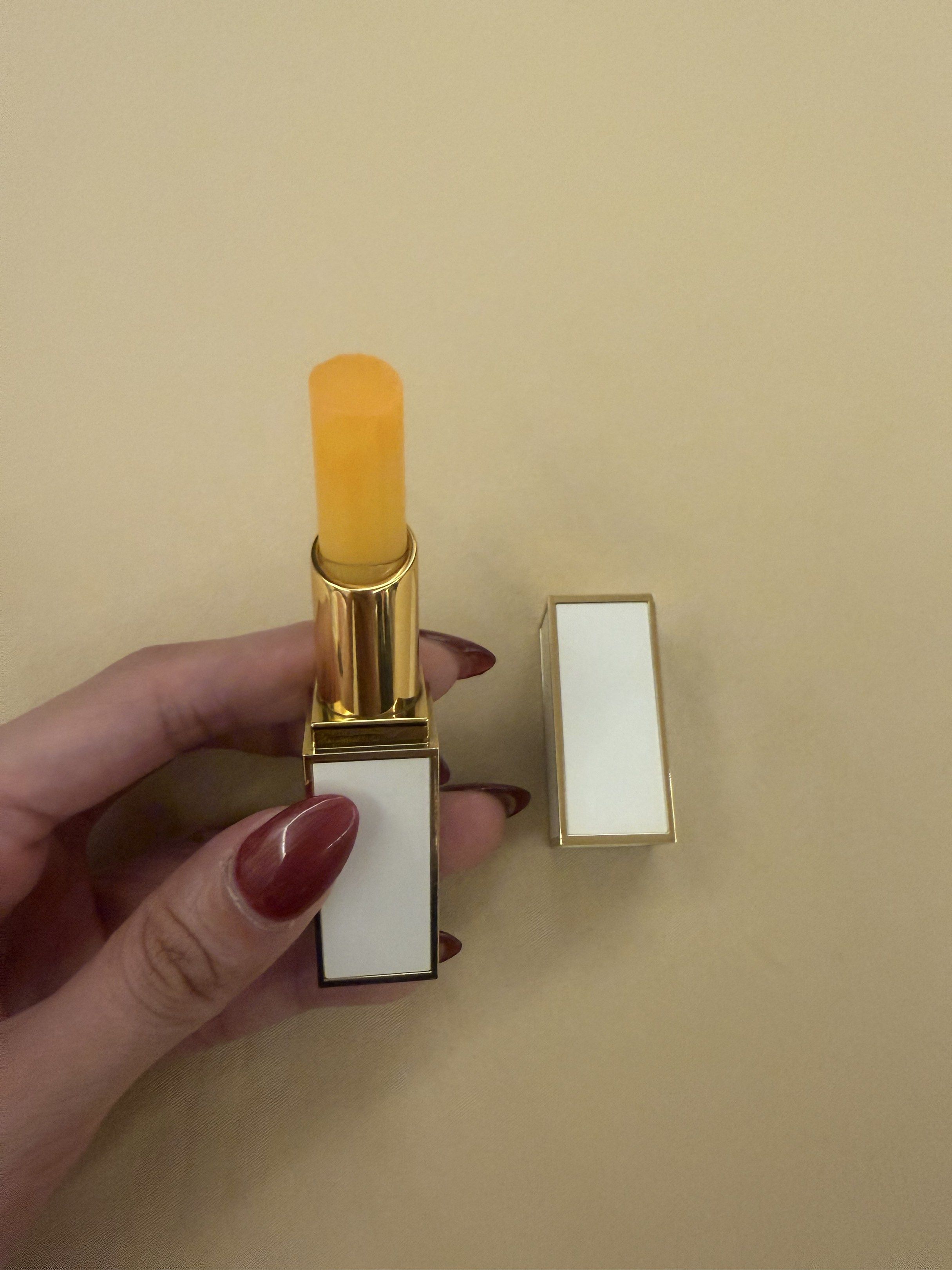 Tom Ford Lumiere Lip Baume 01 (Category: Makeup) located in Lucena. Submitted by fashioncult.ph (Listing ID 1417848467, Image 3). Description: - Tom Ford Lumiere Lip Baume in shade 01 - Gold and white rectangular packaging - Light orange balm color - Lip illuminator -FULL size.