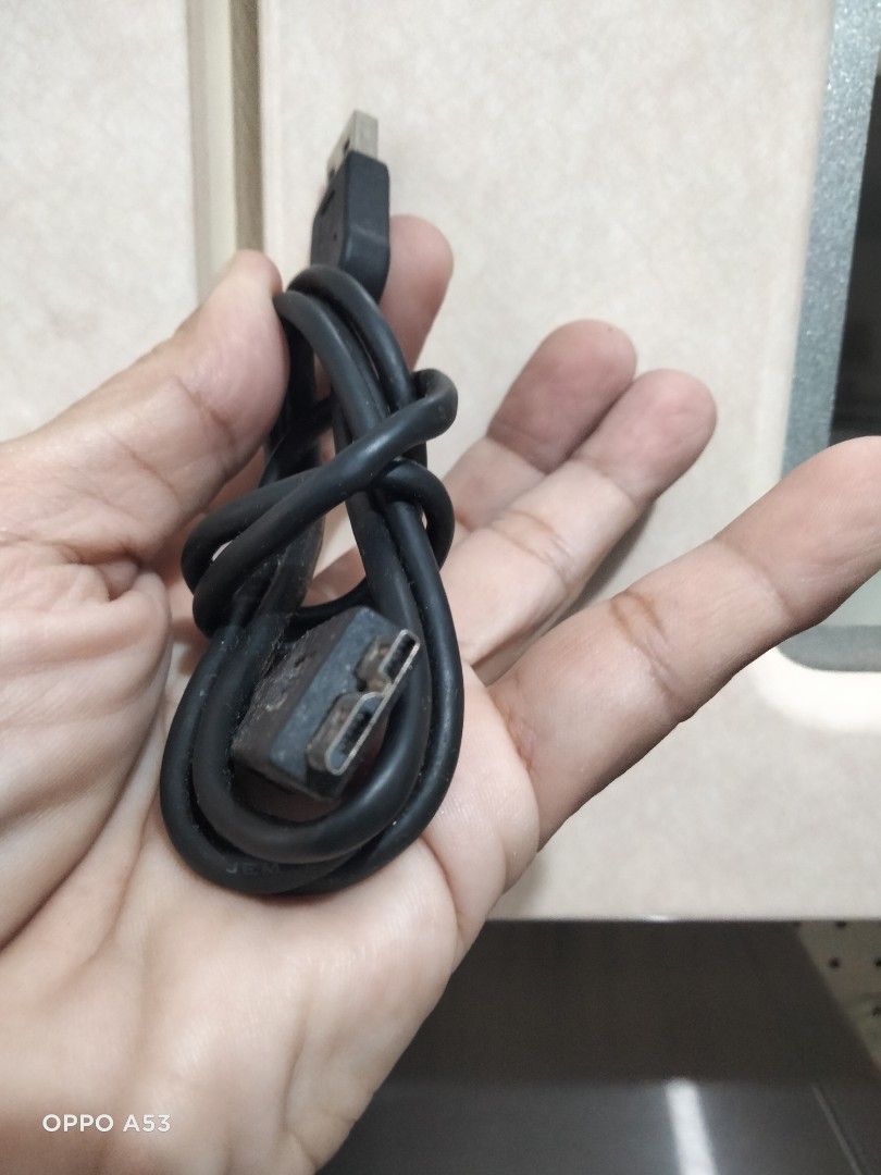 USB 3.0 Cable (Category: Cables & Adaptors) located in Carmona. Submitted by rpute (Listing ID 1418011194, Image 2). Description: Black USB 3.0 cable. One end is a USB 3.0 Type-A connector, and the other end is a USB 3.0 Micro-B connector. It is suitable for connecting external hard drives, and other devices that use a USB 3.0 Micro-B port..