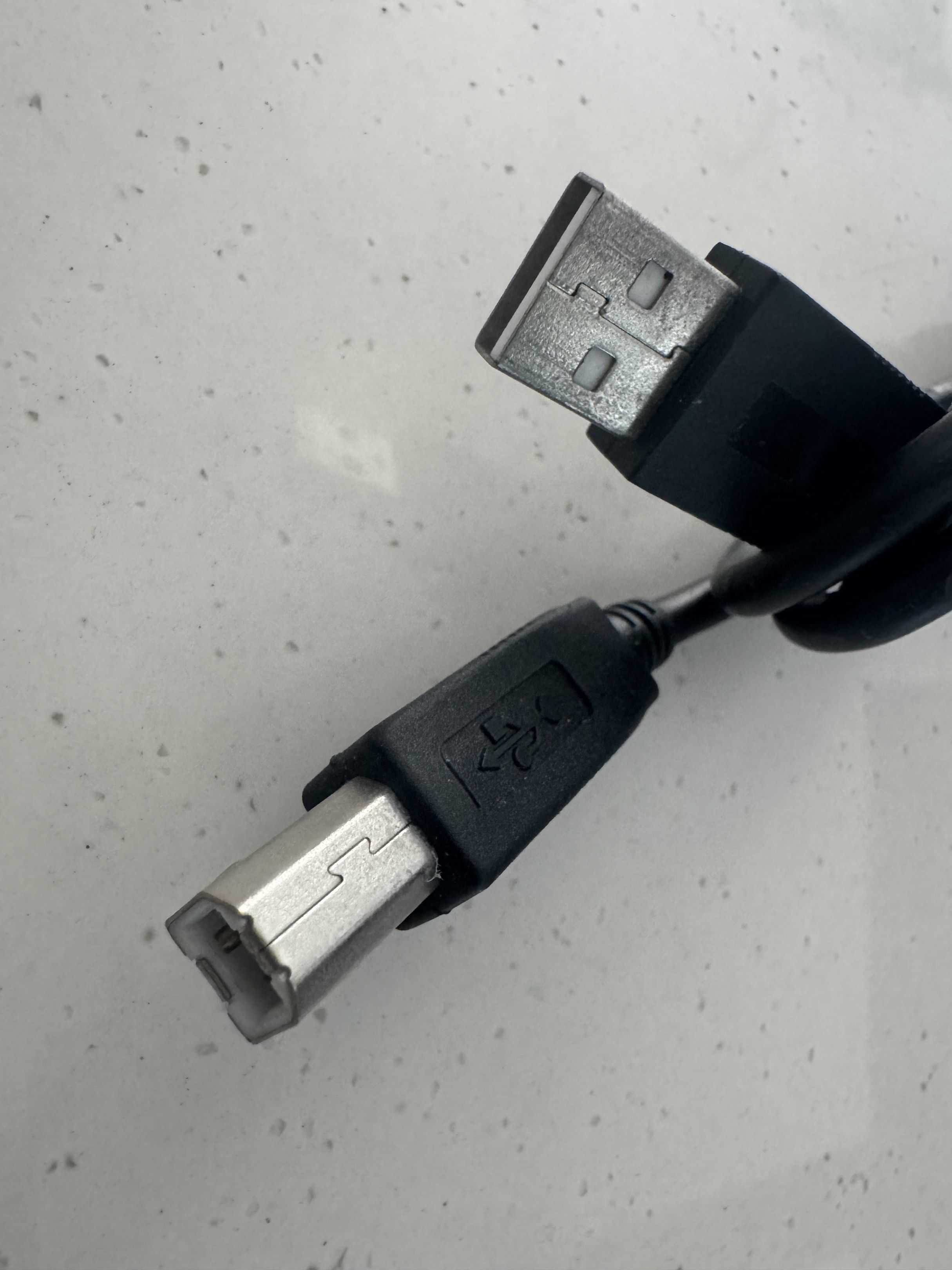 USB Printer Cable (Category: Cables & Adaptors) located in Singapore. Submitted by saltoftheworld (Listing ID 1417906789, Image 1). Description: - USB printer cable - Ready to use - Black color - Connects printer to computer.