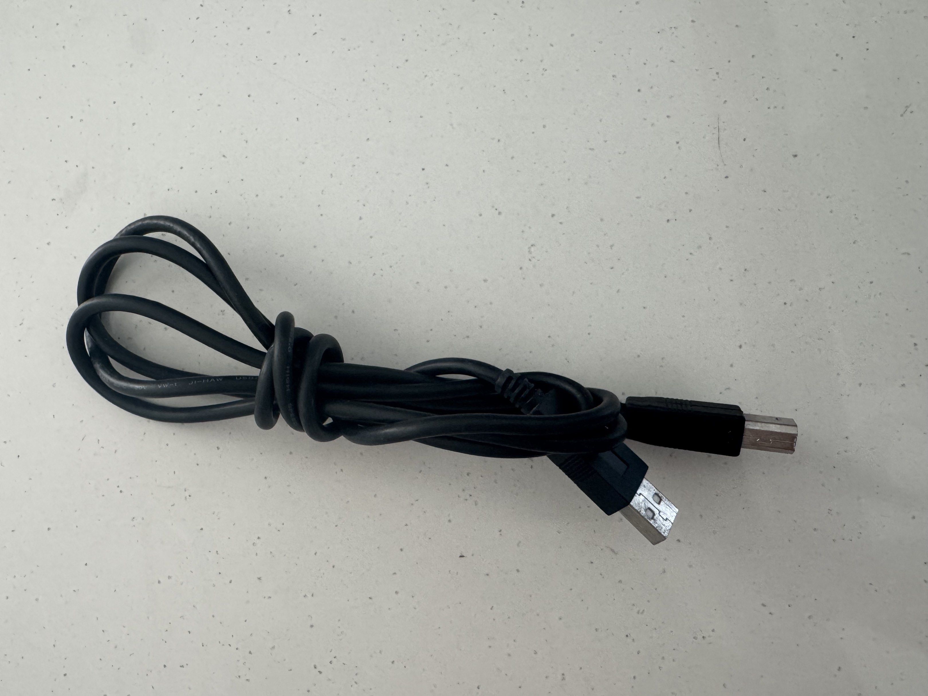 USB Printer Cable (Category: Cables & Adaptors) located in Singapore. Submitted by saltoftheworld (Listing ID 1417906789, Image 2). Description: - USB printer cable - Ready to use - Black color - Connects printer to computer.