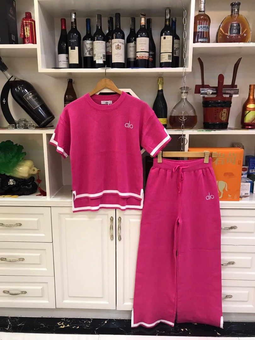 Yoga Sweatshirt and Pants Set (Category: Activewear) located in Manila. Submitted by raredeer-4deb4e (Listing ID 1417837355, Image 1). Description: - Alo Yoga set includes a short-sleeved sweatshirt and matching pants. - Sweatshirt features a crew neck and white trim on sleeves and hem. - Pants have a drawstring waist and white trim at the hem. - Both pieces are branded with the Alo logo. - Available colors: Pink and Beige..