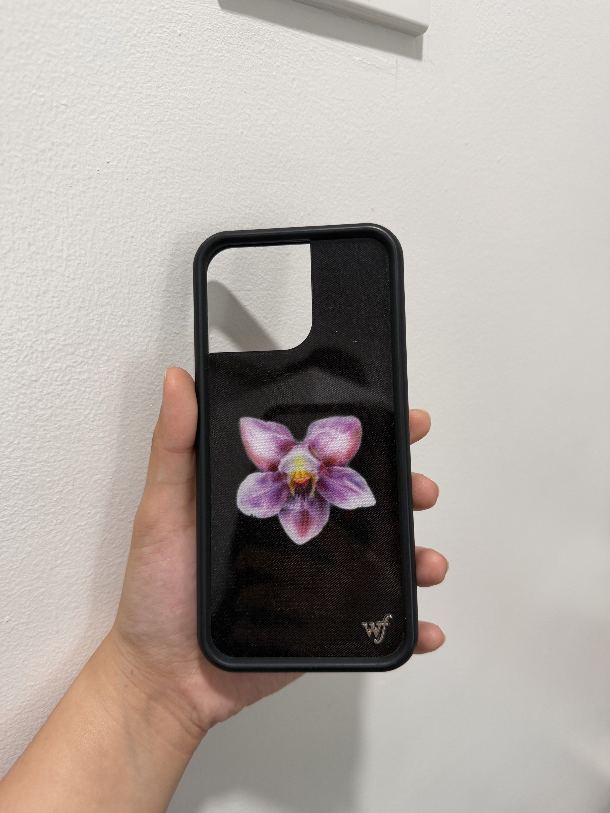16 Pro Max | WILDFLOWER Orchid iPhone Case (Category: Cases & Sleeves) located in Dagupan City. Submitted by why_m (Listing ID 1418132819, Image 2). Description: 📌 Authentic — bought in the US - NO LOWBALLING — already way less than SRP - For iPhone 16 Pro Max - With hairline scratches, barely visible (check last 2 pics) RFS: Upgraded.