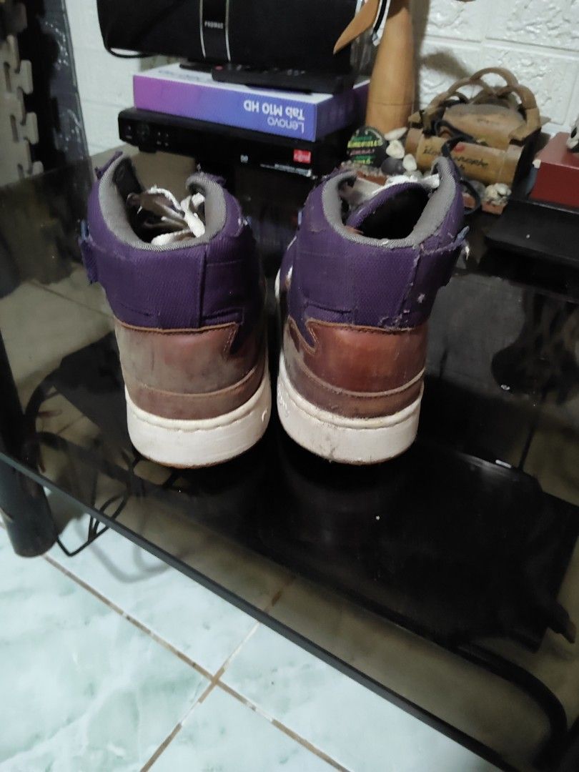 Adidas Forum Mid Purple Sneakers (Category: Sneakers) located in San Mateo. Submitted by dealrose032 (Listing ID 1418024342, Image 3). Description: - Adidas Forum Mid sneakers - Color: Purple and brown - White Adidas three stripes - Brown and white soles - High-top style - Features laces and strap - Shows some wear on soles.