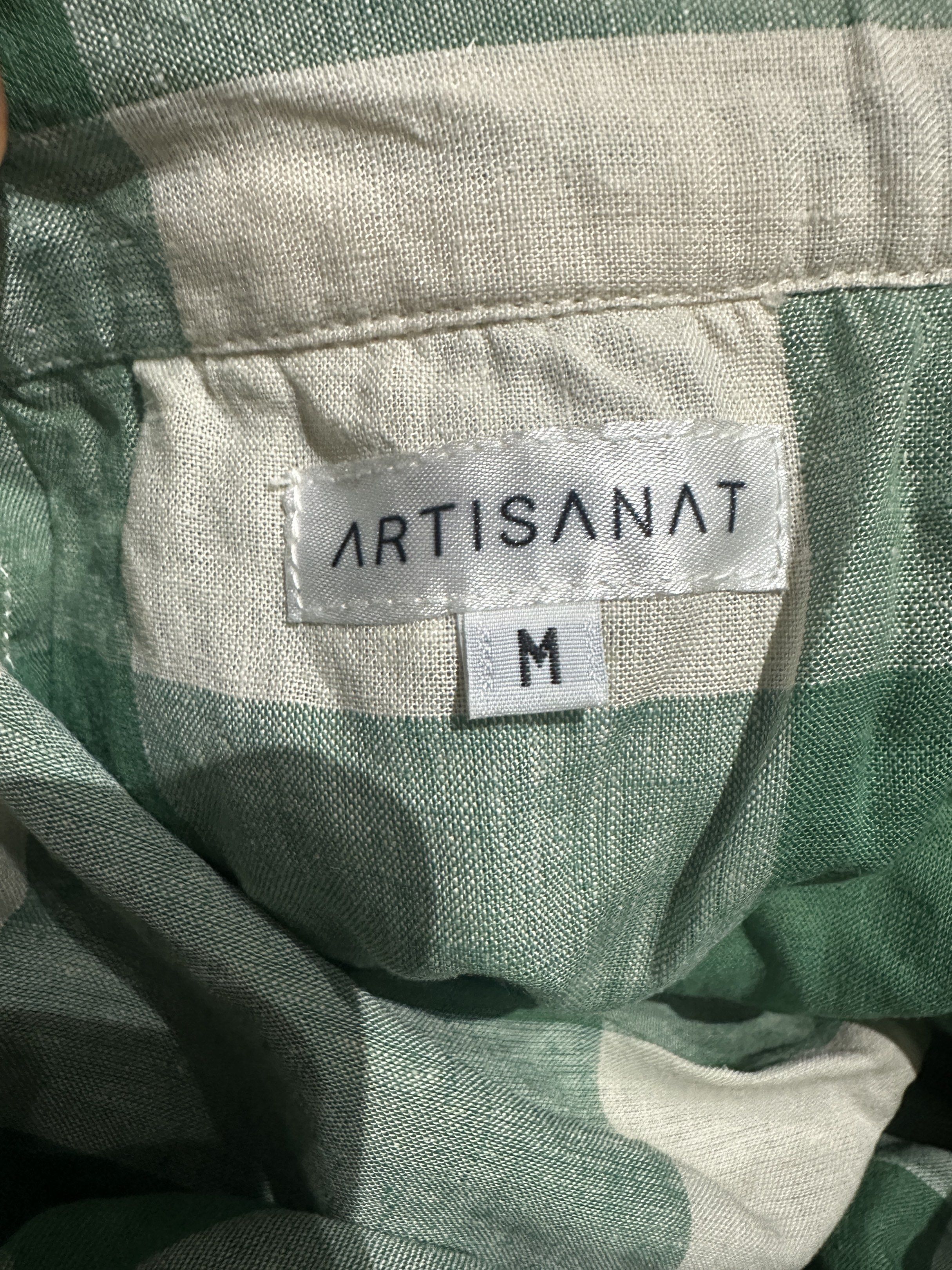 Artisanat Green Checkered Tiered Skirt (Category: Skirts) located in Mabalacat. Submitted by jastin17 (Listing ID 1418107314, Image 2). Description: - Artisanat skirt - Green and white checkered pattern - Size M on tag but fits small - Tiered design - Comfortable fit - Lightweight and breathable fabric - Suitable for warm weather - Perfect for casual or evening wear.