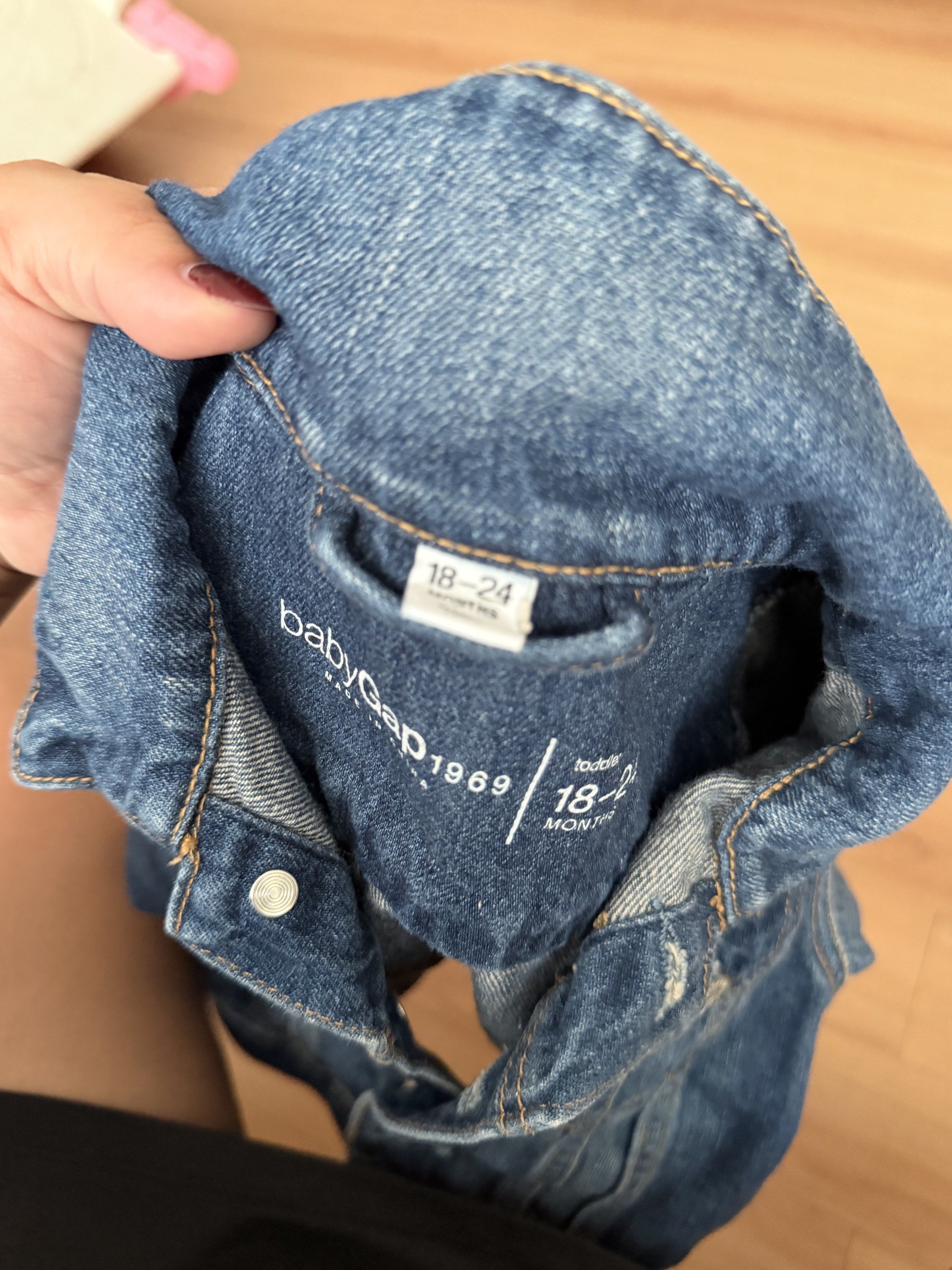 Baby Gap Denim Jacket 18-24 Months (Category: Babies & Kids Fashion) located in Quezon City. Submitted by griveraa1224 (Listing ID 1418206937, Image 3). Description: - Baby Gap denim jacket - Size: 18-24 months - Classic design - Button closures - Collared neckline - Made in China - Great for layering.