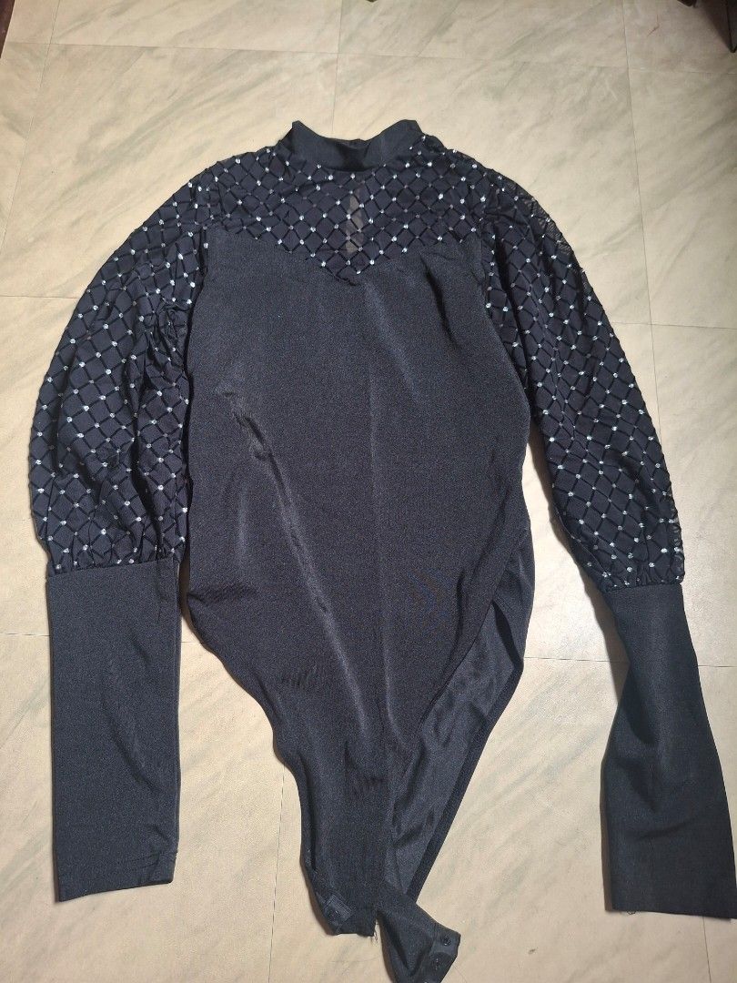 Black Bodysuit with Embellished Sleeves (Category: Others Tops) located in Quezon City. Submitted by cafe.kaye (Listing ID 1418020078, Image 1). Description: - Black long-sleeved bodysuit - Intricate embellished detailing on sleeves - Unique sleeve pattern - High neckline - Smooth, solid fabric on torso - Form-fitting design - Suitable for various occasions used once for taylor swift concert reputation era will include free glitter socks (a littl