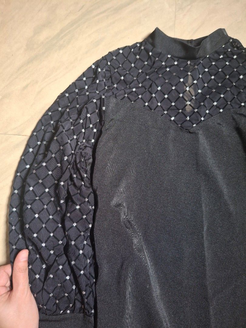 Black Bodysuit with Embellished Sleeves (Category: Others Tops) located in Quezon City. Submitted by cafe.kaye (Listing ID 1418020078, Image 2). Description: - Black long-sleeved bodysuit - Intricate embellished detailing on sleeves - Unique sleeve pattern - High neckline - Smooth, solid fabric on torso - Form-fitting design - Suitable for various occasions used once for taylor swift concert reputation era will include free glitter socks (a littl