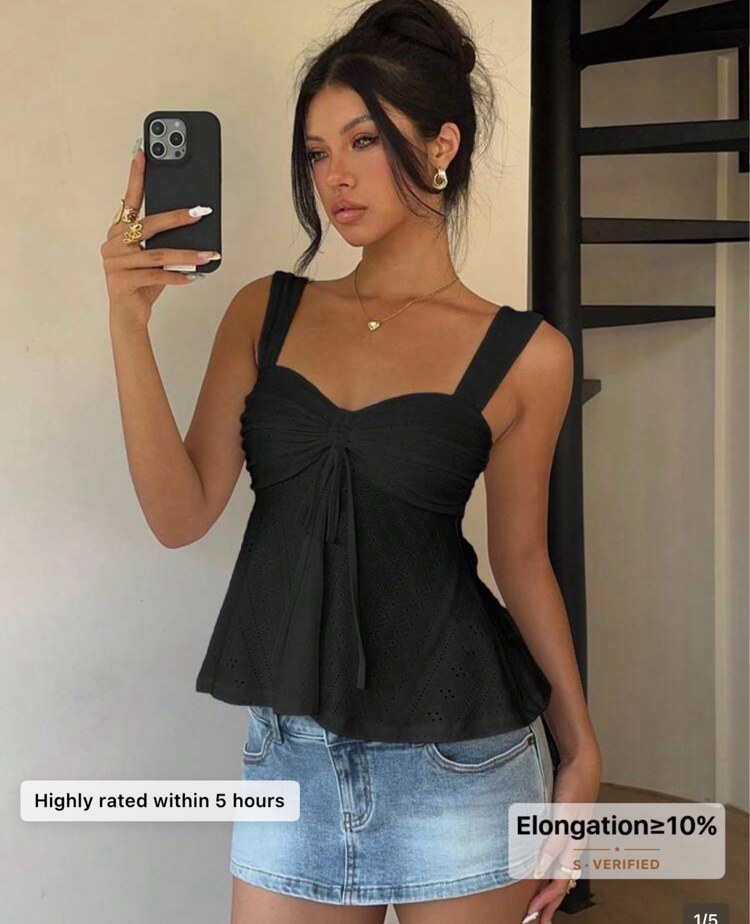 Black Eyelet Top (Category: Sleeveless) located in Manila. Submitted by youngforest (Listing ID 1418064589, Image 1). Description: - Black top - Eyelet detailing - Sweetheart neckline - Tie detail - Peplum hem - Chic and feminine style - Elongation of at least 10%.