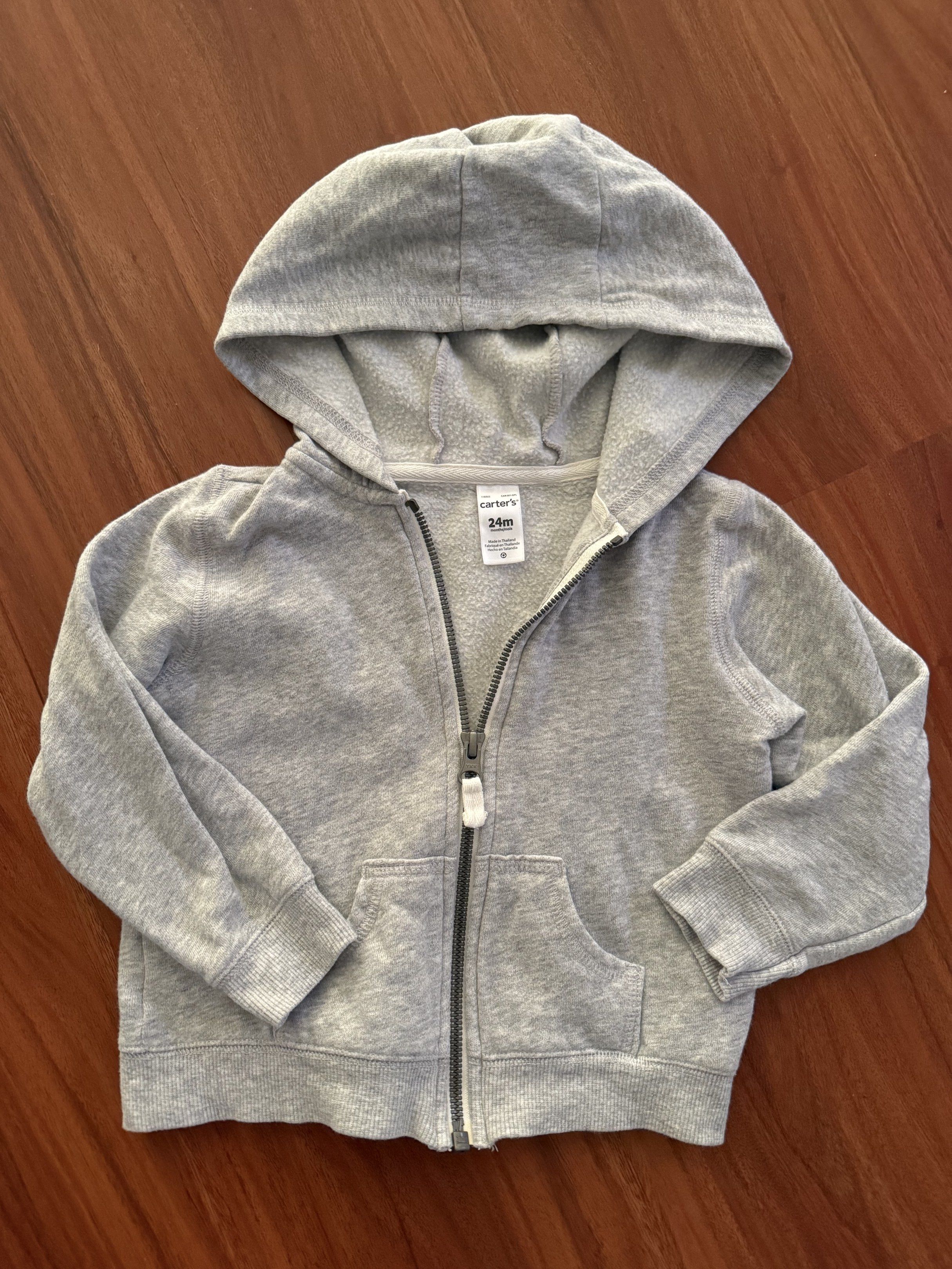 Carter's Gray Hoodie 24m (Category: Babies & Kids Fashion) located in Makati City. Submitted by larcie (Listing ID 1418084300, Image 1). Description: - Carter's gray hoodie - Size: 24 months - Full zipper closure - Hooded - Front pocket - Made in Thailand.