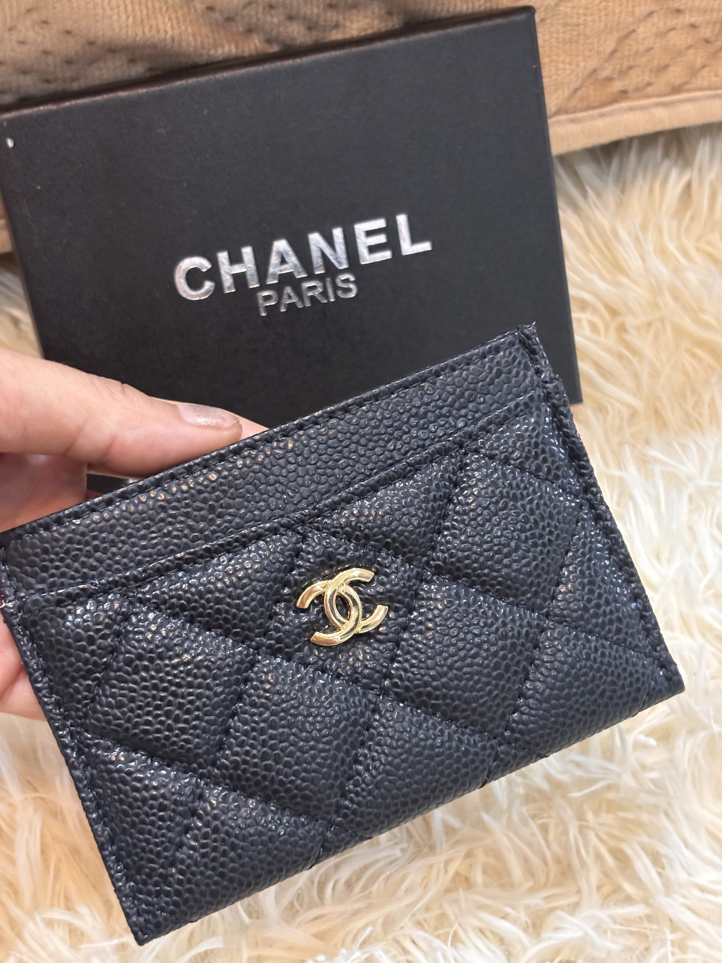 Chanel Caviar Card Holder (Category: Luxury Bags & Wallets) located in Cebu City. Submitted by day.98 (Listing ID 1418028925, Image 3). Description: - Selected from japan surplus - Black caviar leather - Features CC logo and diamond quilting - Includes original box and authenticity card - Burgundy fabric interior - Stylish and compact.