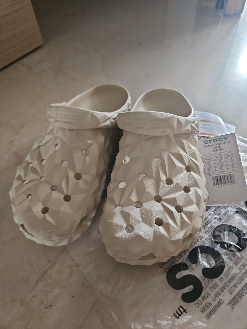 Crocs Echo Clog - Bone (Category: Flipflops and Slides) located in Singapore. Submitted by rapuser2006 (Listing ID 1418108521, Image 1). Description: - Brand new Crocs Echo Clogs - Bone color. Size : M9/W11 - Original packaging and tags - Comfortable and stylish design - Ideal for everyday use.