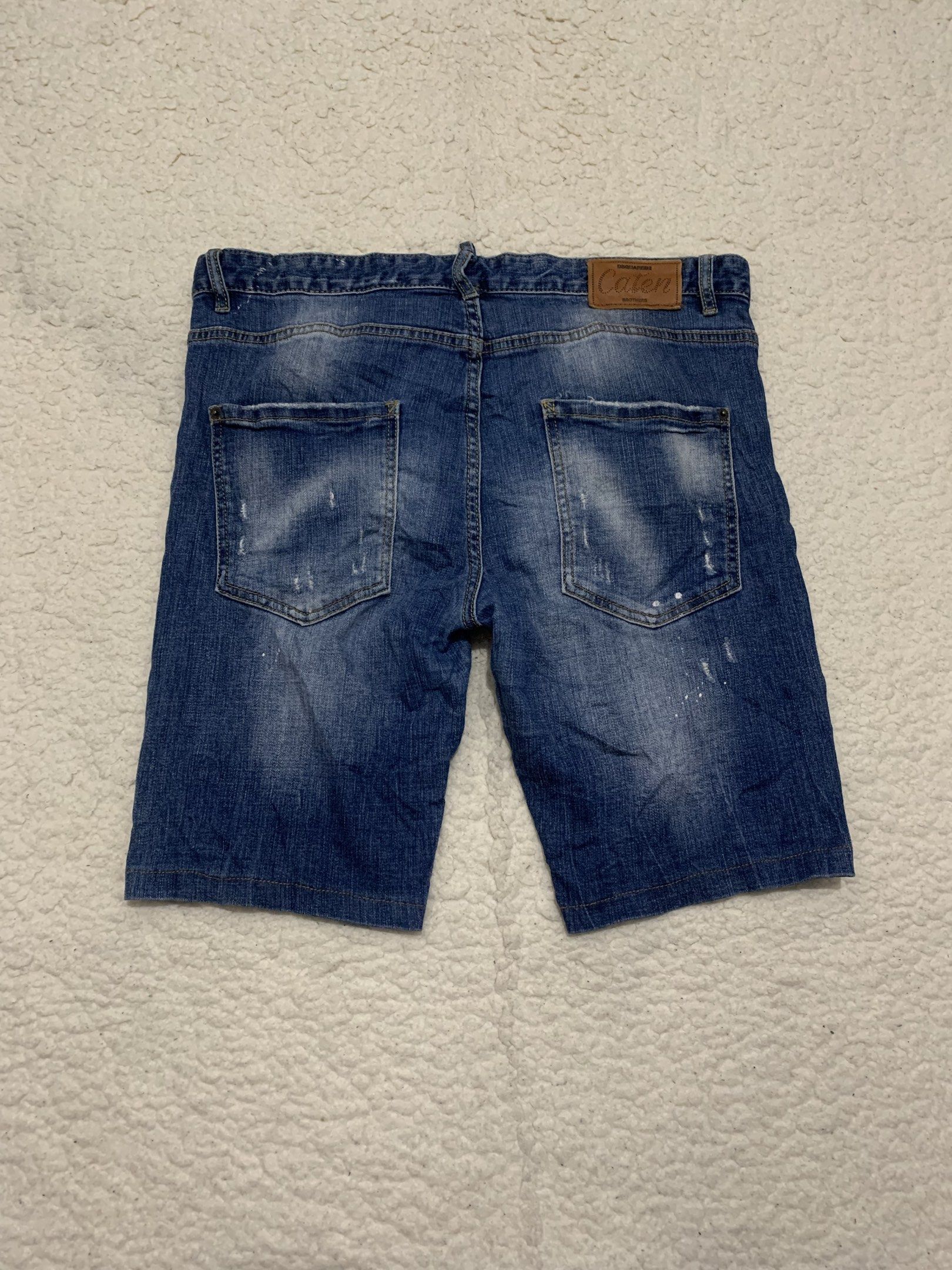 Dsquared2 Distressed Blue Denim Short (Category: Shorts) located in Dipolog. Submitted by knightorious_thrift (Listing ID 1418150972, Image 2). Description: Size 52 on tag Waist: 35-36 Length: 19.5 Leg opening: 8.5 Excellent condition .