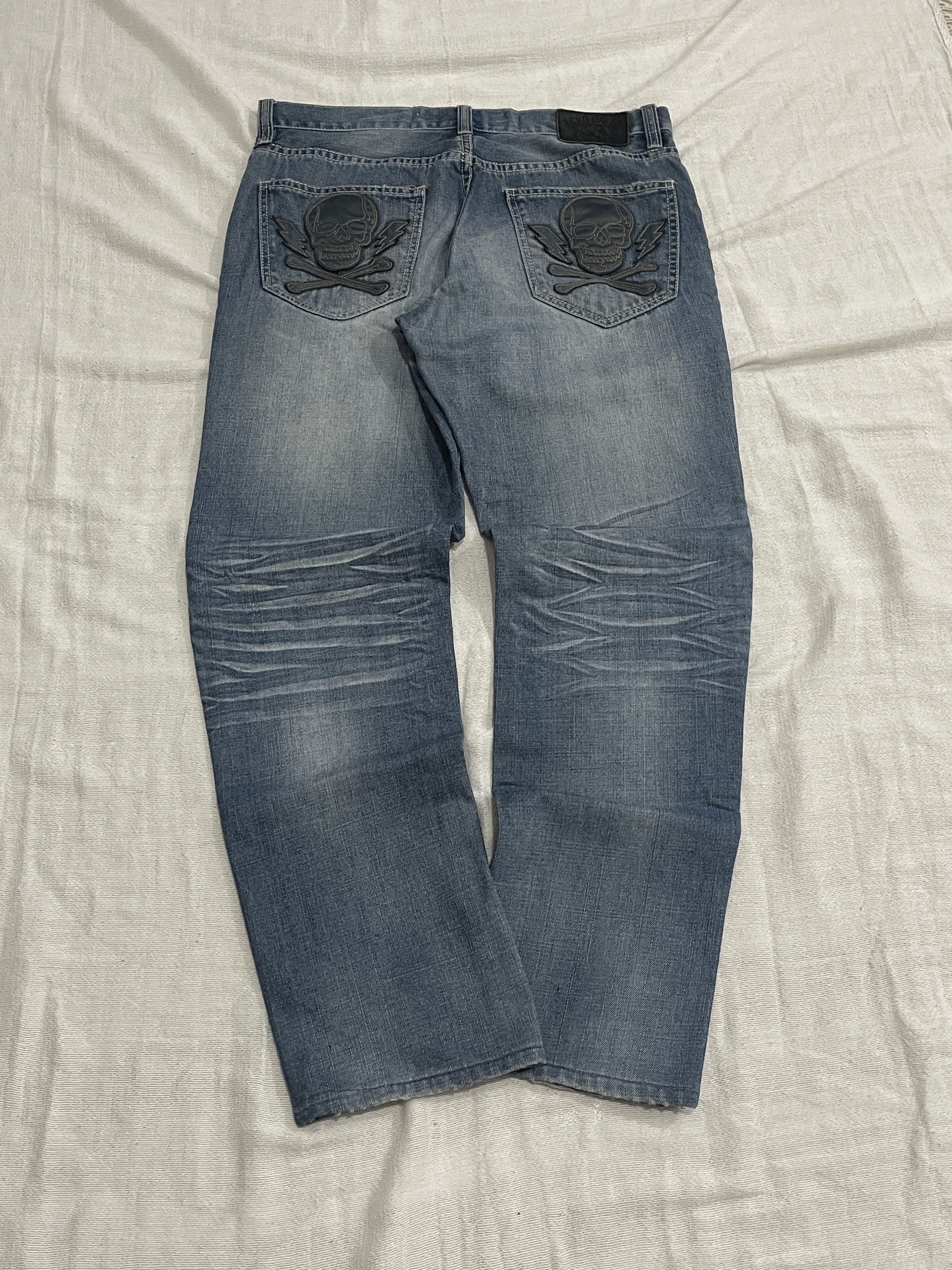 Ecko Unltd. Skull Jeans - Straight Fit (Category: Jeans) located in San Fernando. Submitted by duhrnig (Listing ID 1418081549, Image 1). Description: RARE Vintage Ecko Unltd Y2K Skull Patch Denim (Not a Reissue) Authentic early-2000s Ecko Unlta jeans featuring skull + lightning patch detail. Straight cut, vintage tag, and soft worn-in denim - true Y2K archive streetwear piece. Measurements: • Waist: 32 in • Length: 40 in • Thigh: 11 in • Leg Open