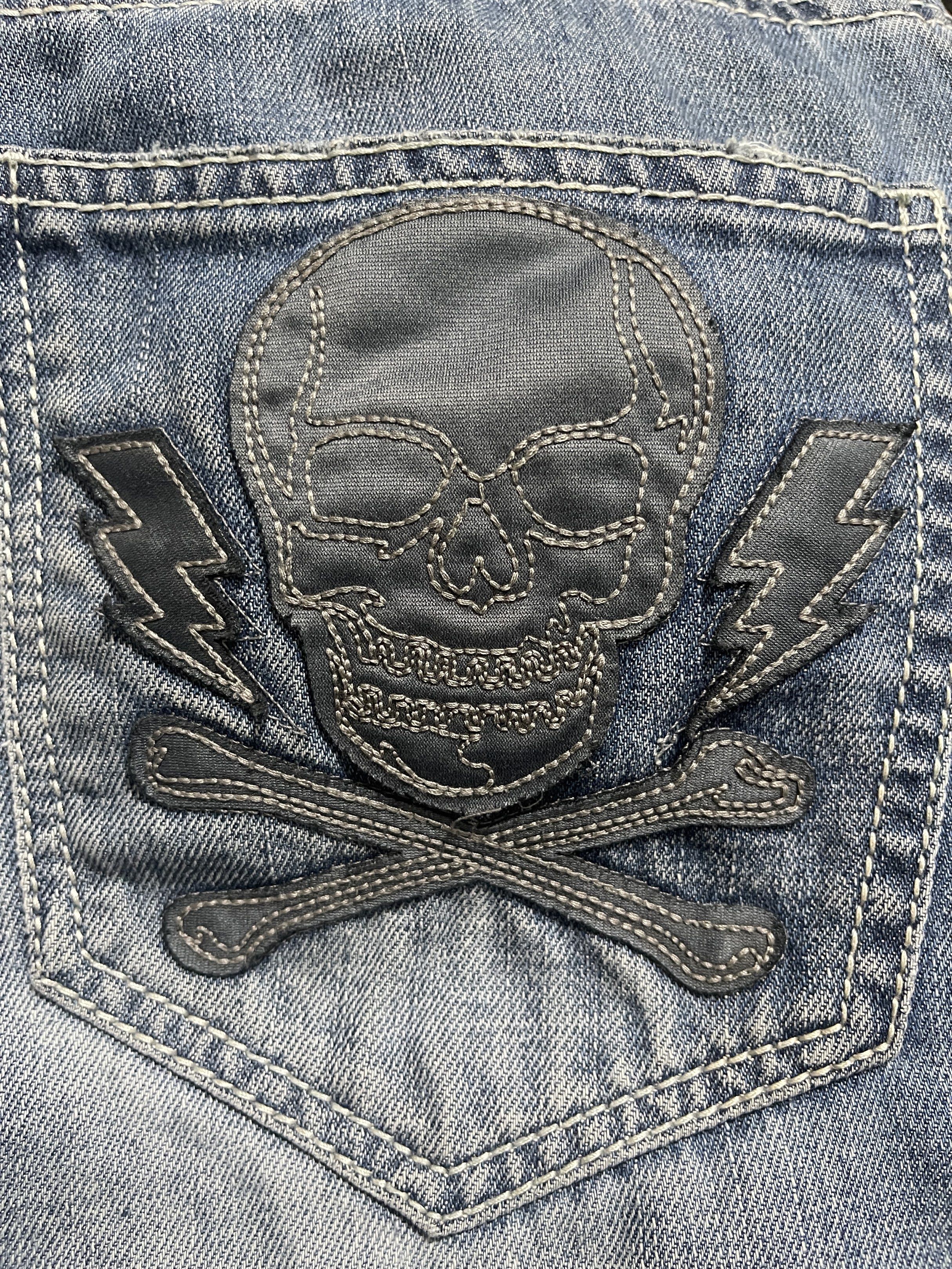 Ecko Unltd. Skull Jeans - Straight Fit (Category: Jeans) located in San Fernando. Submitted by duhrnig (Listing ID 1418081549, Image 3). Description: RARE Vintage Ecko Unltd Y2K Skull Patch Denim (Not a Reissue) Authentic early-2000s Ecko Unlta jeans featuring skull + lightning patch detail. Straight cut, vintage tag, and soft worn-in denim - true Y2K archive streetwear piece. Measurements: • Waist: 32 in • Length: 40 in • Thigh: 11 in • Leg Open
