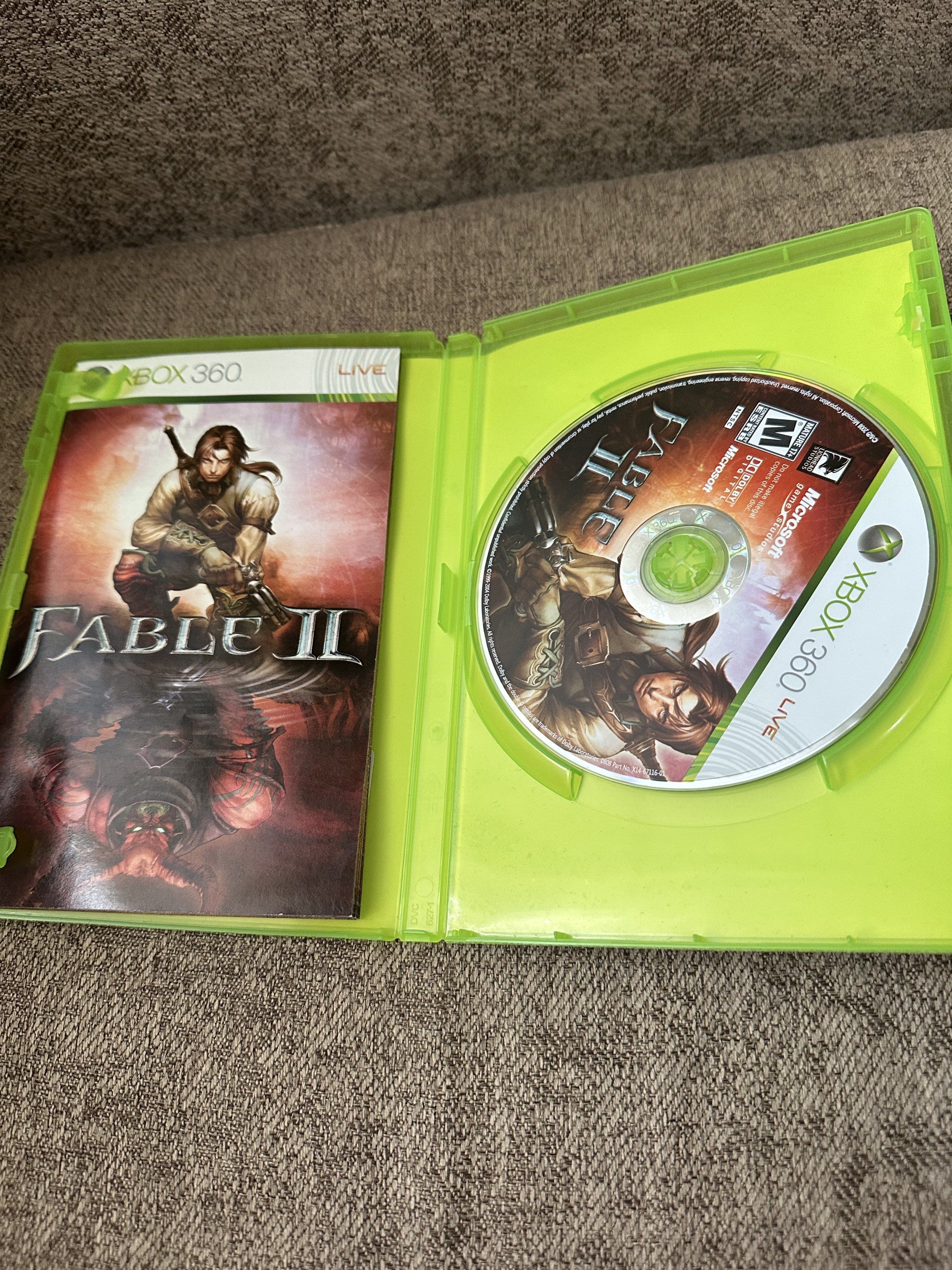 Fable II Xbox 360 Game (Category: Xbox) located in Carmona. Submitted by francisder50014 (Listing ID 1418075108, Image 2). Description: - Fable II for Xbox 360 - Fantasy action RPG - Includes game disc - Original cover art included - Case shows gameplay details and ESRB rating - Rated M for Mature.