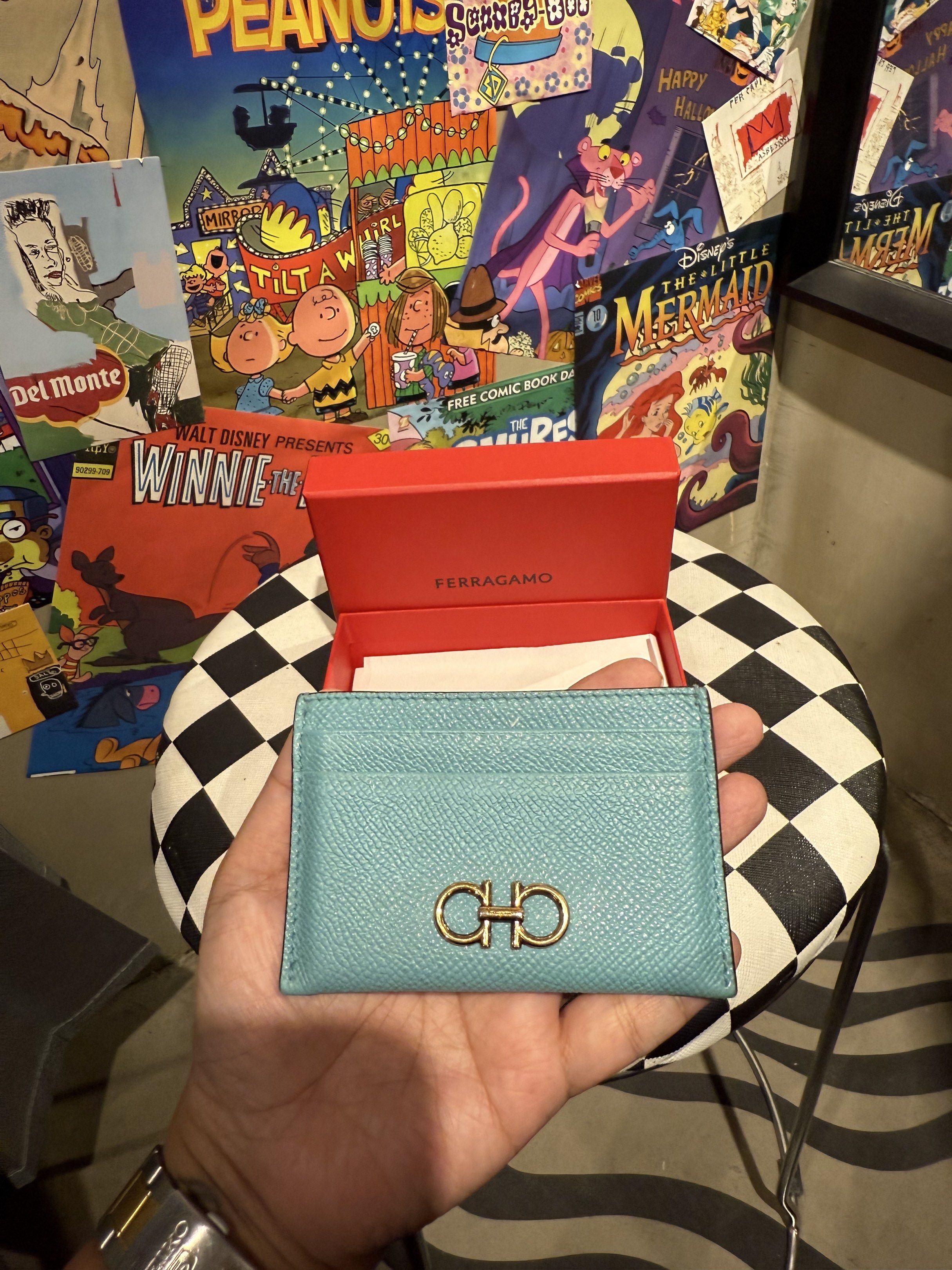 Ferragamo Card Holder (Category: Luxury Bags & Wallets) located in Cebu City. Submitted by conyosh (Listing ID 1418079619, Image 3). Description: - Authentic Ferragamo card holder - Beautiful teal color - Features the iconic gold Gancini logo - Comes with original red box - Perfect for cards and bills - Stylish and compact.
