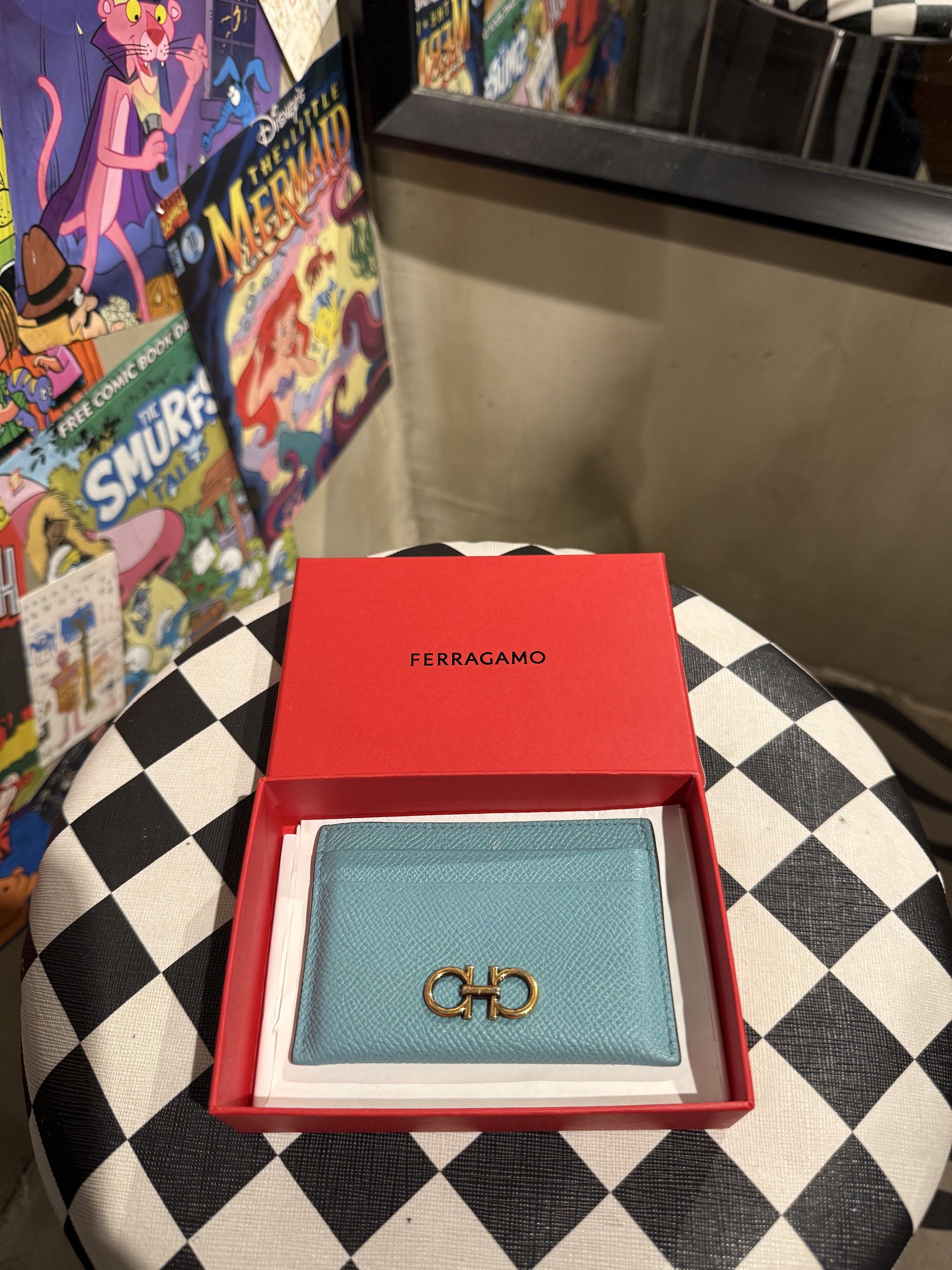 Ferragamo Card Holder (Category: Luxury Bags & Wallets) located in Cebu City. Submitted by conyosh (Listing ID 1418079619, Image 1). Description: - Authentic Ferragamo card holder - Beautiful teal color - Features the iconic gold Gancini logo - Comes with original red box - Perfect for cards and bills - Stylish and compact.