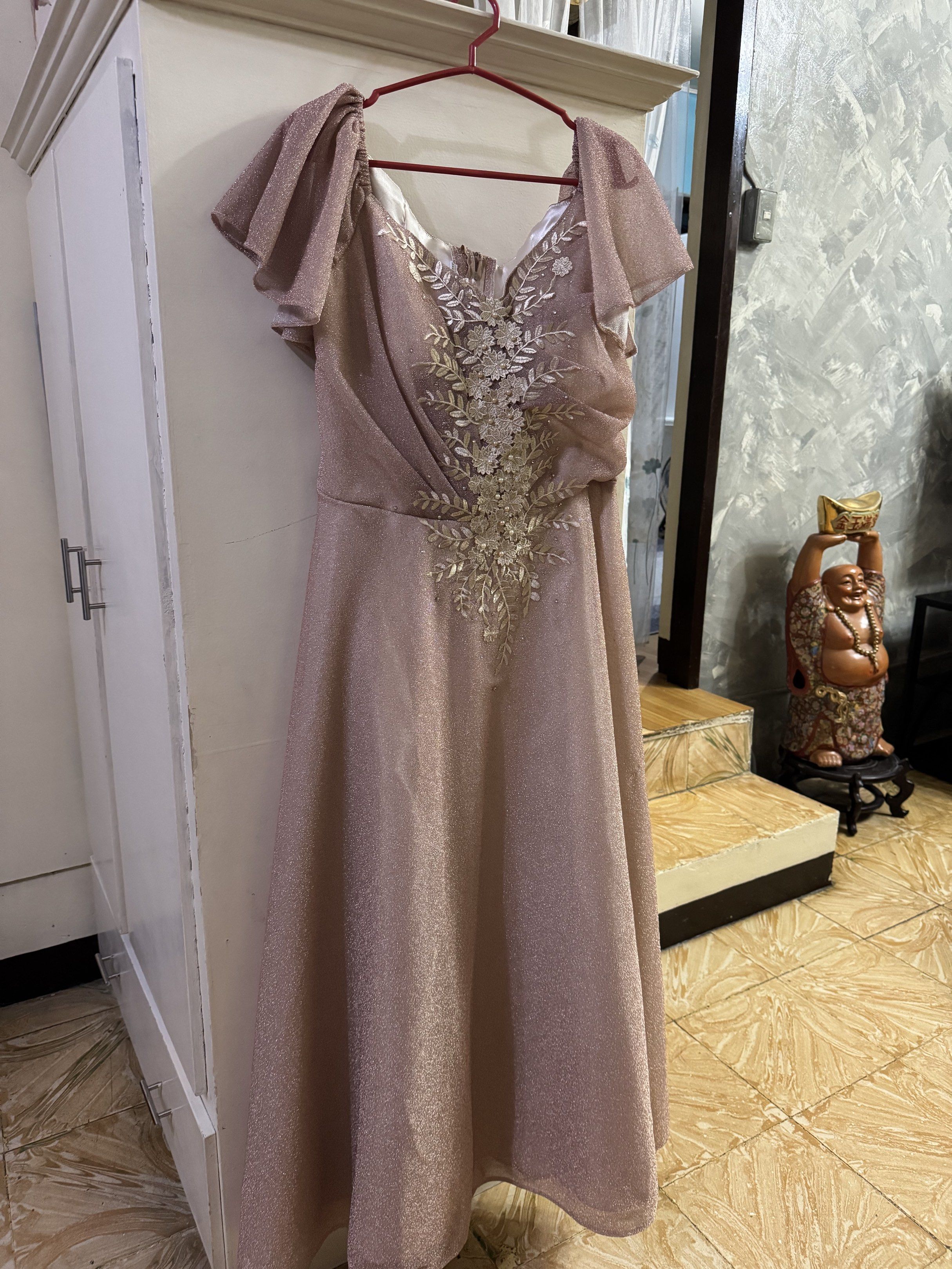 Formal Dress for Wedding entourage (Category: Dresses) located in Muntinlupa City. Submitted by bricknbrix (Listing ID 1418153588, Image 1). Description: Shop Price: P2,800 RFS: Not needed anymore, found a new gown for wedding - Light champagne pink formal dress - A-line silhouette - Short, flutter sleeves - Delicate floral embroidery - Zipper closure at the back.