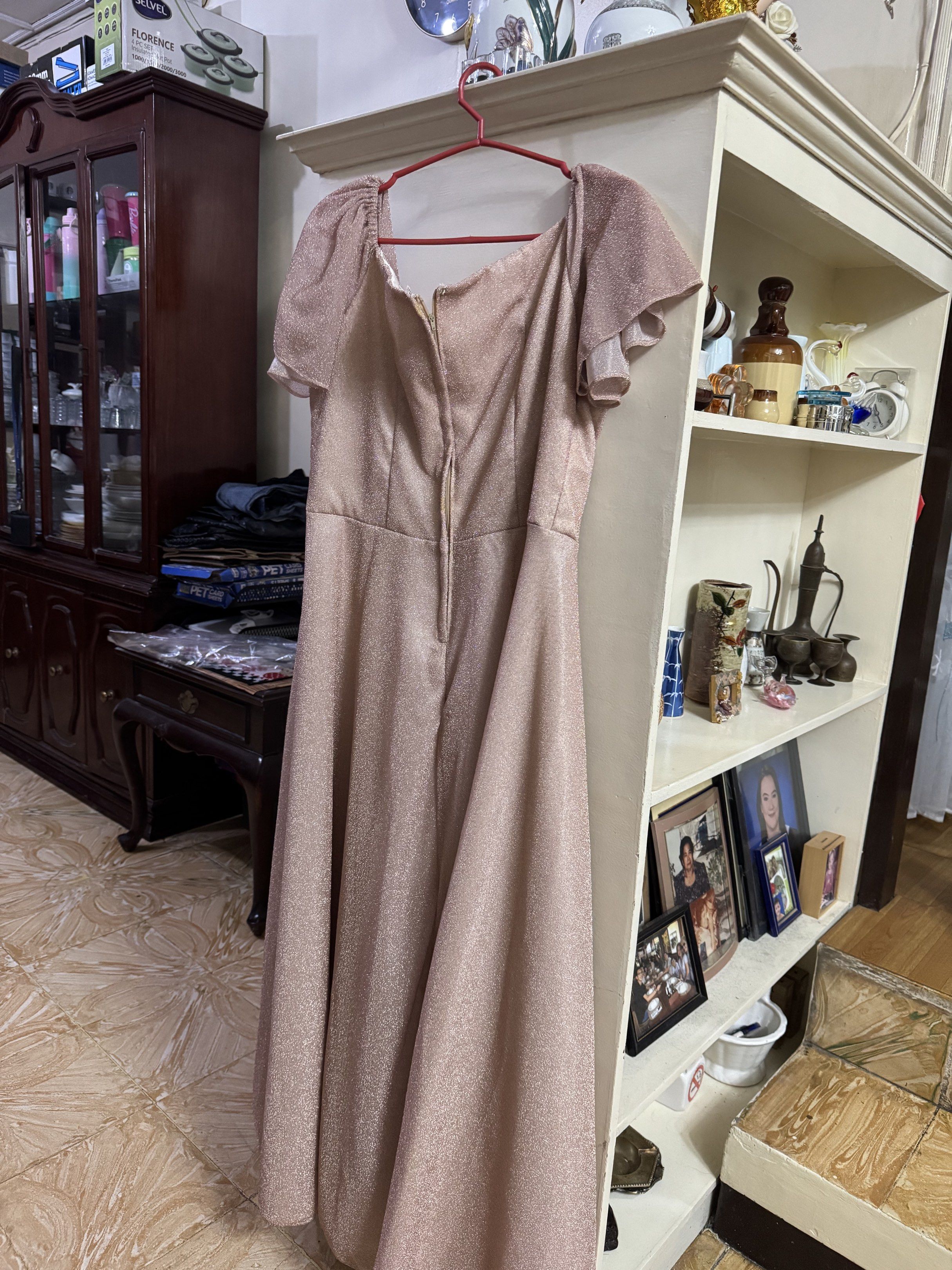 Formal Dress for Wedding entourage (Category: Dresses) located in Muntinlupa City. Submitted by bricknbrix (Listing ID 1418153588, Image 2). Description: Shop Price: P2,800 RFS: Not needed anymore, found a new gown for wedding - Light champagne pink formal dress - A-line silhouette - Short, flutter sleeves - Delicate floral embroidery - Zipper closure at the back.
