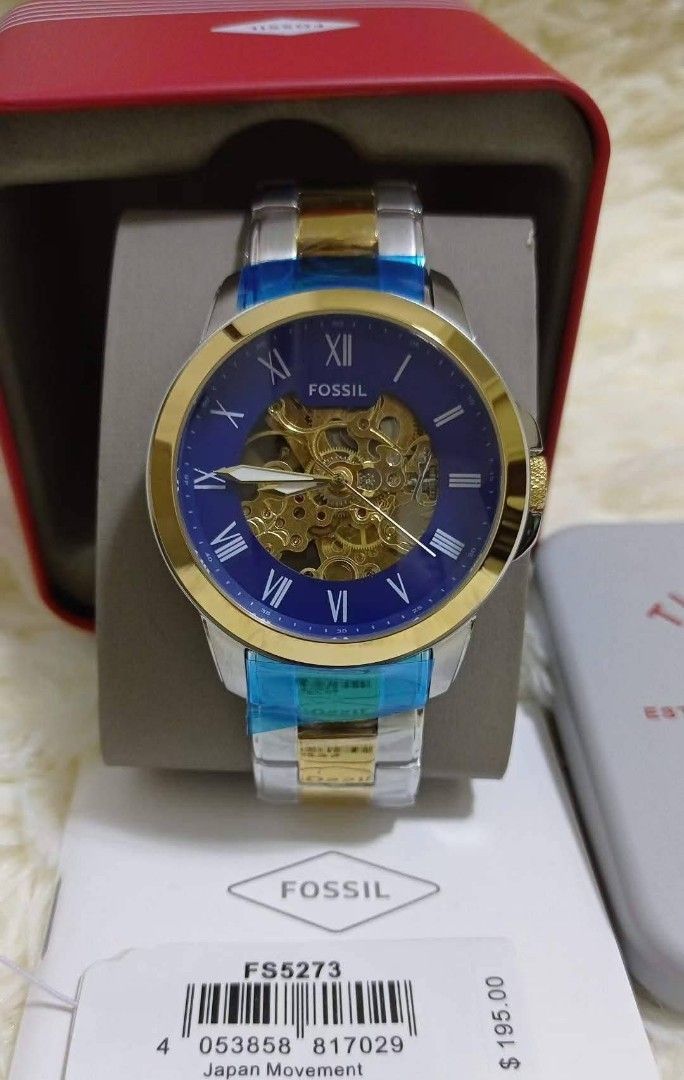 Fossil FS5273 Automatic Watch (Category: Men's Watches) located in Manila. Submitted by raredeer-4deb4e (Listing ID 1418048002, Image 1). Description: - Fossil Automatic Watch - Skeleton Dial - Stainless Steel Band with Gold Accents - Includes Original Box and Tags - Roman Numeral Hour Markers - Available with Blue or Black Face.
