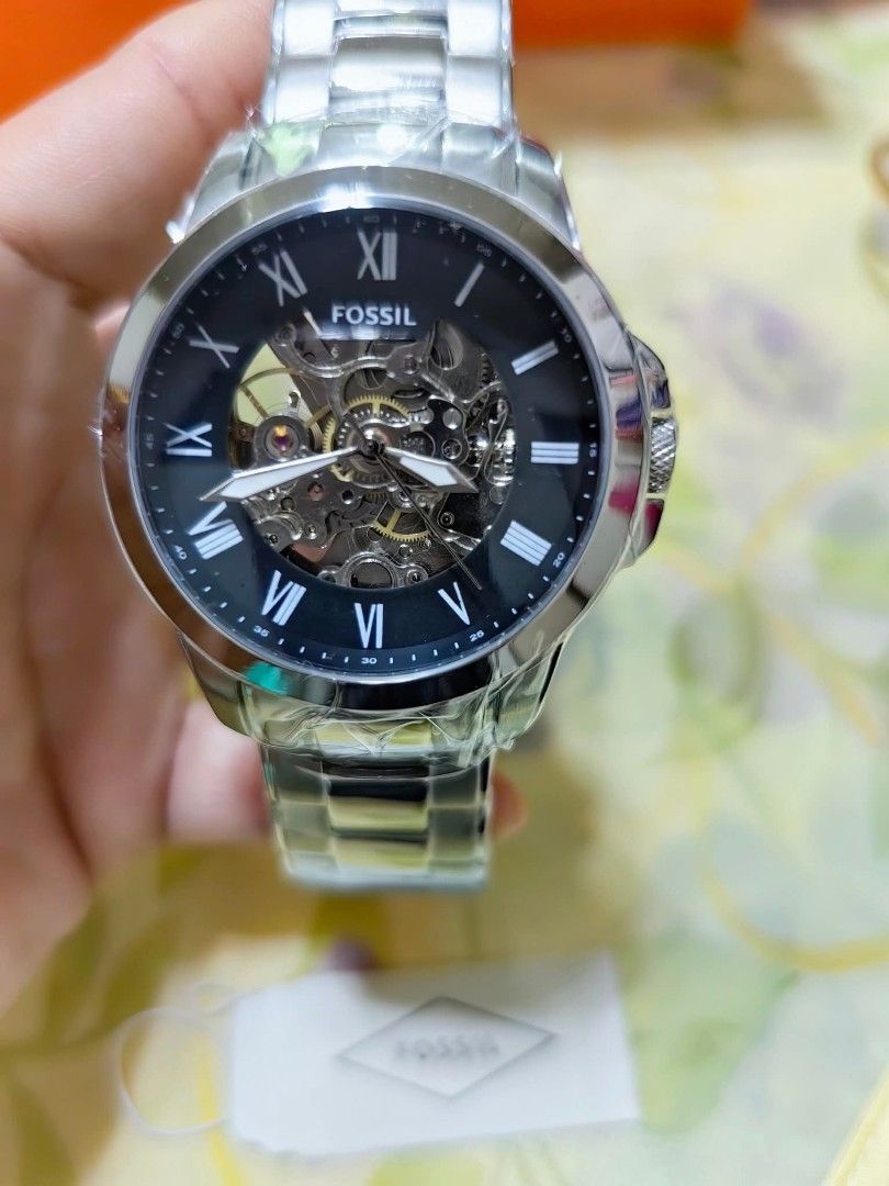 Fossil FS5273 Automatic Watch (Category: Men's Watches) located in Manila. Submitted by raredeer-4deb4e (Listing ID 1418048002, Image 2). Description: - Fossil Automatic Watch - Skeleton Dial - Stainless Steel Band with Gold Accents - Includes Original Box and Tags - Roman Numeral Hour Markers - Available with Blue or Black Face.