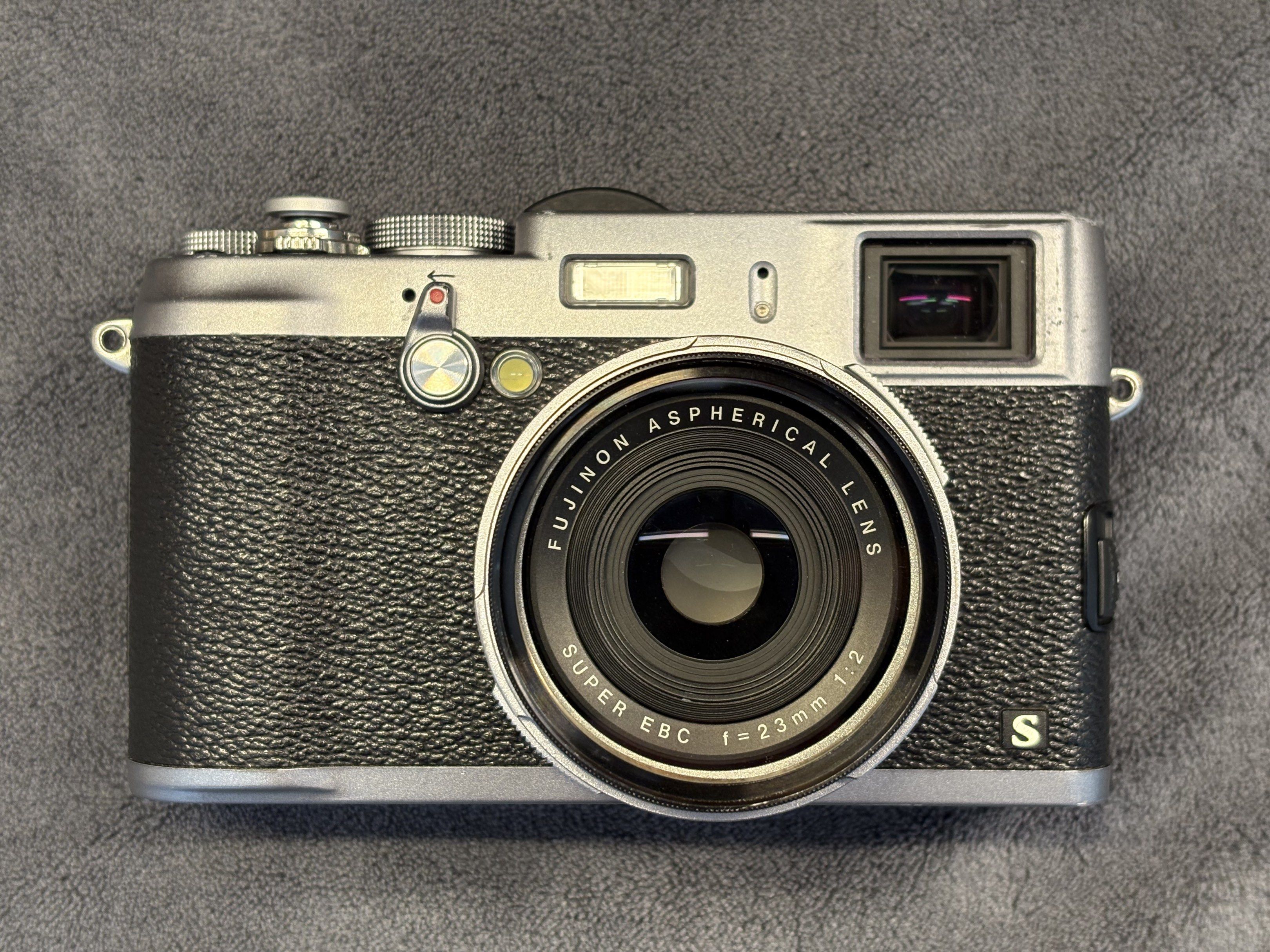 Fujifilm X100S (Category: Cameras) located in Iloilo. Submitted by xvr190 (Listing ID 1418048990, Image 1). Description: -body has scratches and signs of wear -fully functional, OVF overlay working, EVF working, Flash working, all buttons, levers and dials working -comes with original charger, 3rd party batteries 3pcs, filter adapter, filter, lens cap, lens hood, soft shutter button, hotshoe level RFS: downsizing my collection ***all sales final,