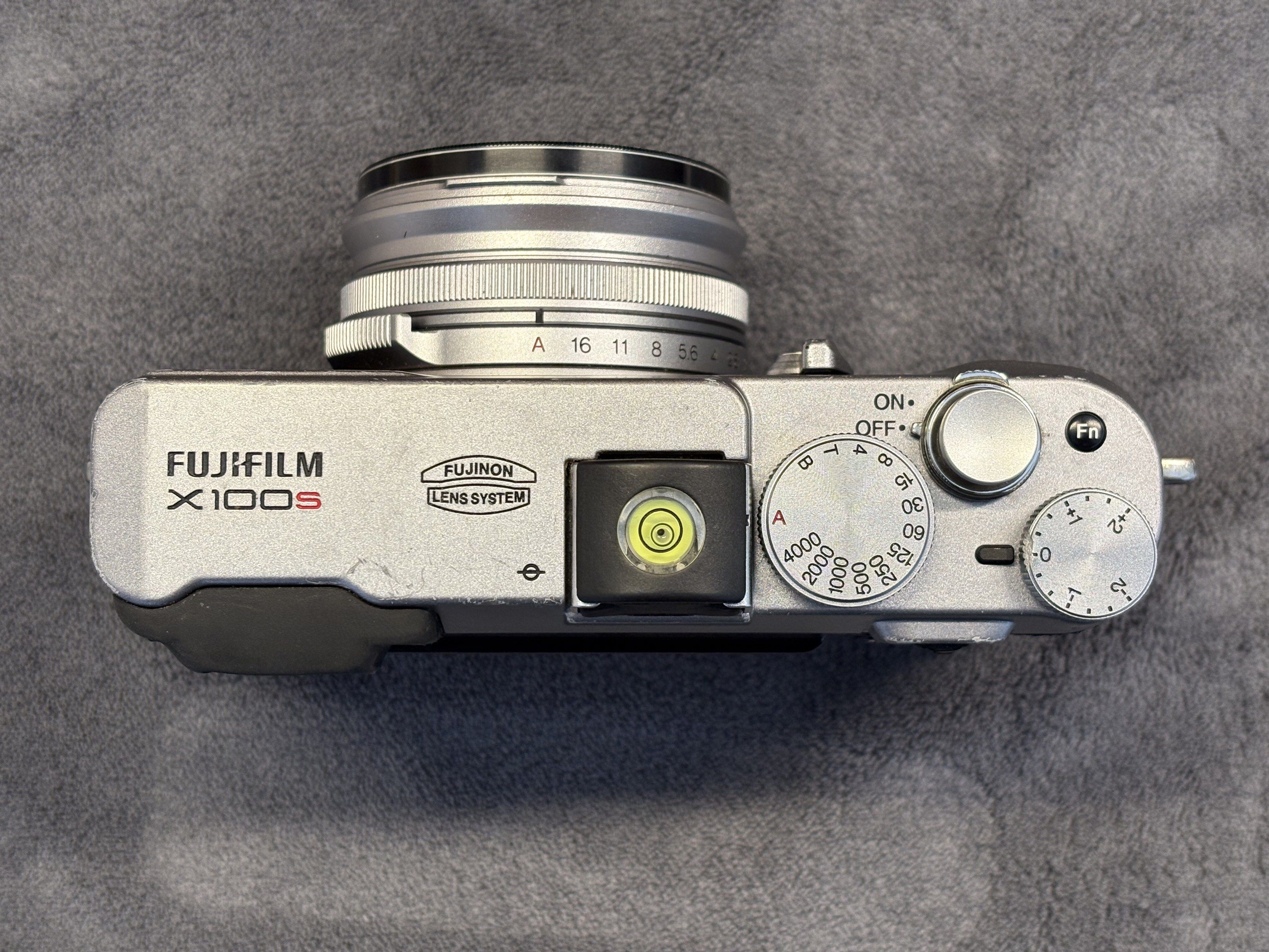 Fujifilm X100S (Category: Cameras) located in Iloilo. Submitted by xvr190 (Listing ID 1418048990, Image 3). Description: -body has scratches and signs of wear -fully functional, OVF overlay working, EVF working, Flash working, all buttons, levers and dials working -comes with original charger, 3rd party batteries 3pcs, filter adapter, filter, lens cap, lens hood, soft shutter button, hotshoe level RFS: downsizing my collection ***all sales final,