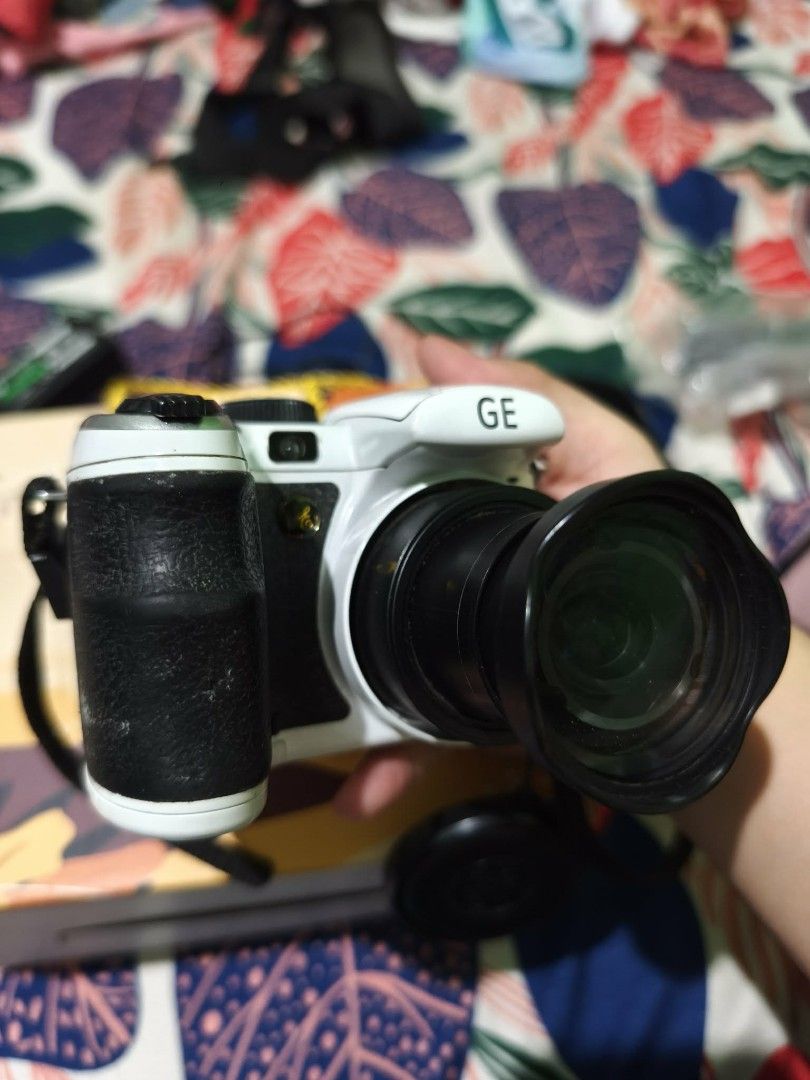 GE X500 Digital Camera (Category: Cameras) located in Quezon City. Submitted by zh_nn (Listing ID 1418201835, Image 3). Description: Specs: • 14 megapixels • 15x optical zoom + 5.7x digital zoom • 2.7" LCD screen • Built-in flash Inclusions: 1. Unit itself (w/ signs of usage) 2. 4pcs AA Alkaline Batteries 3. 16GB Memory Card 4. Camera bag The following have been tested: 1. Flash ✅ 2. Buttons ✅ Issues: • Mode dial is slightly loose but still worki