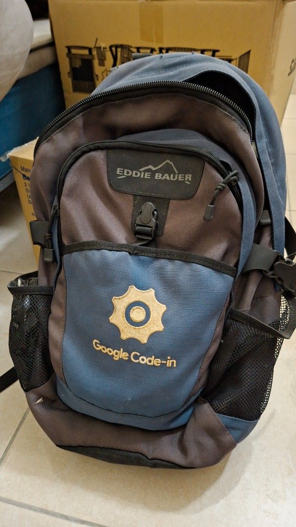 Google Code-in Backpack Special Edition (Category: Backpacks) located in Petaling Jaya. Submitted by f4ww4z_ (Listing ID 1418073775, Image 1). Description: - Very limited edition backpack / laptop bag - Google Code-in logo - Color: Blue and grey - Multiple compartments - Side mesh pockets - Front pocket with buckle closure.