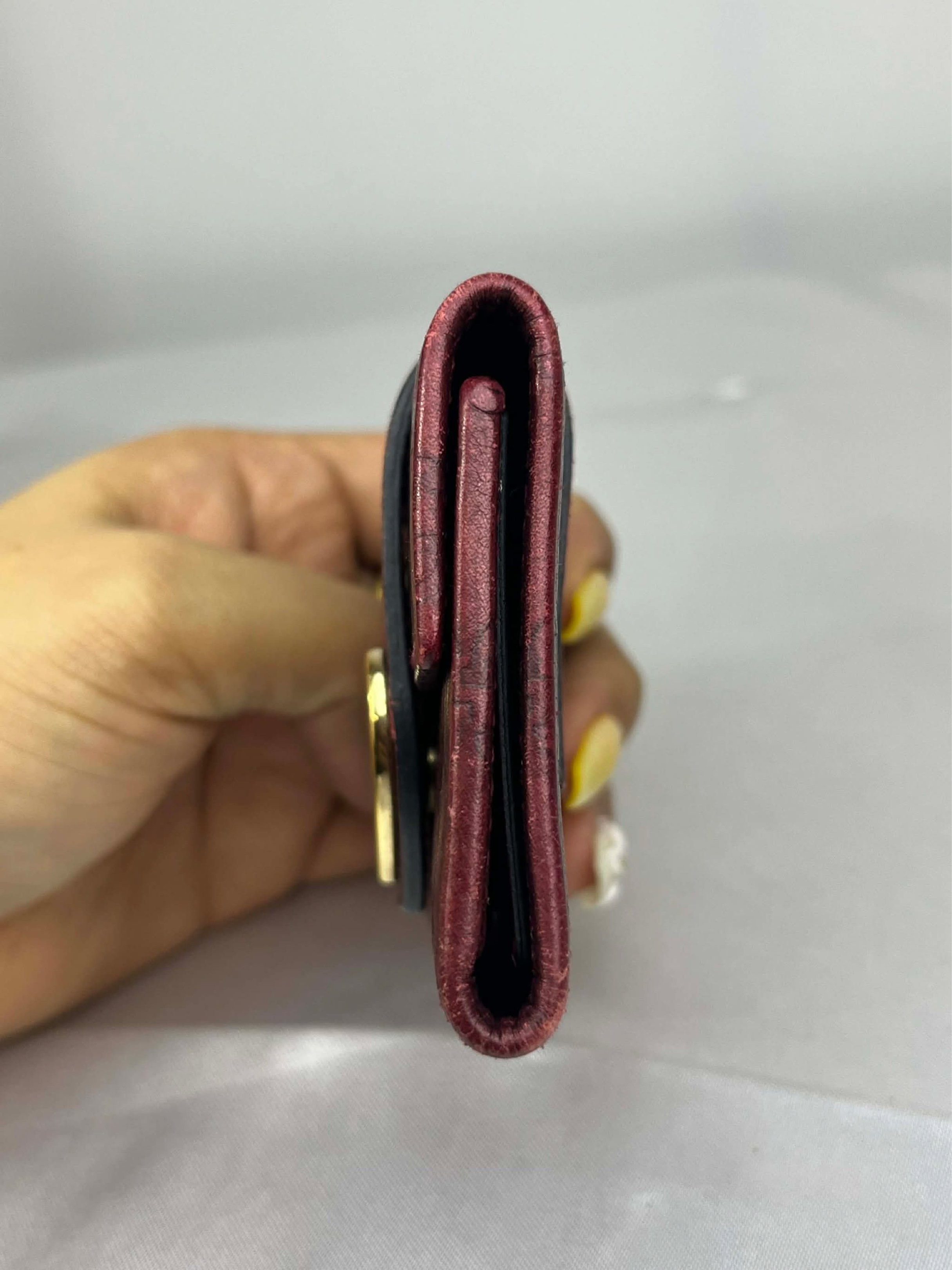 Gucci Heart Key Case (Category: Luxury Bags & Wallets) located in Manila. Submitted by aki7723 (Listing ID 1418124284, Image 3). Description: - Authentic Gucci key case - Deep red color - Gold heart-shaped accent with Gucci logo - Interior key holder and small compartment - Made in Italy - Gucci logo embossed on leather.