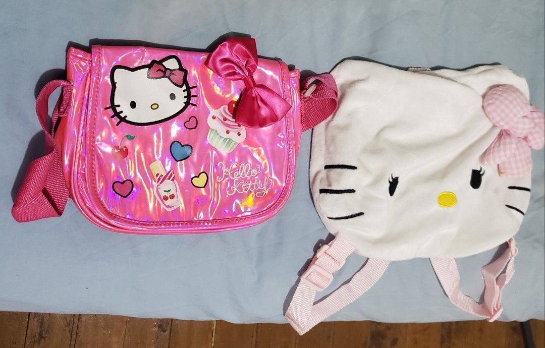 Hello Kitty Shoulder Bag and Backpack Set (Category: Babies & Kids Fashion) located in Manila. Submitted by feg39 (Listing ID 1418023786, Image 1). Description: - Kitty Shoulder Bag: Shiny pink finish, Kitty graphics, bow, and Sanrio tag. - Kitty Backpack: Soft, plush white exterior. - Both bags feature pink straps. - Perfect for Kitty fans!.