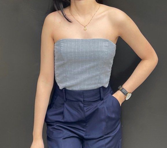 H&M Gray Striped Tube Top (Category: Sleeveless) located in Manila. Submitted by chicdistrict.ph (Listing ID 1418094517, Image 2). Description: - Stylish gray tube top - Vertical stripes - Fitted design - Great with high-waisted bottoms - Versatile for chic outfits - Comfortable fabric.