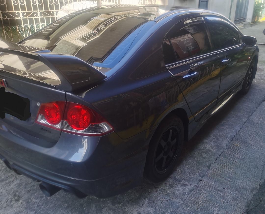 Honda Civic 1.8 VTI-S (A) (Category: Used Cars) located in Manila. Submitted by tabitabz (Listing ID 1418037818, Image 2). Description: Honda Civic FD 1.8S 2006 Model A/T Plate ending number : 9 (Friday coding), LTO registered till 2026 Never flooded, regularly maintained and cleaned. Mileage- 105k+, used as spare/coding unit, auto sweep RFID installed Changed radio unit to Nakamichi screen type head unit. Leathered seats and side panels. Rays br