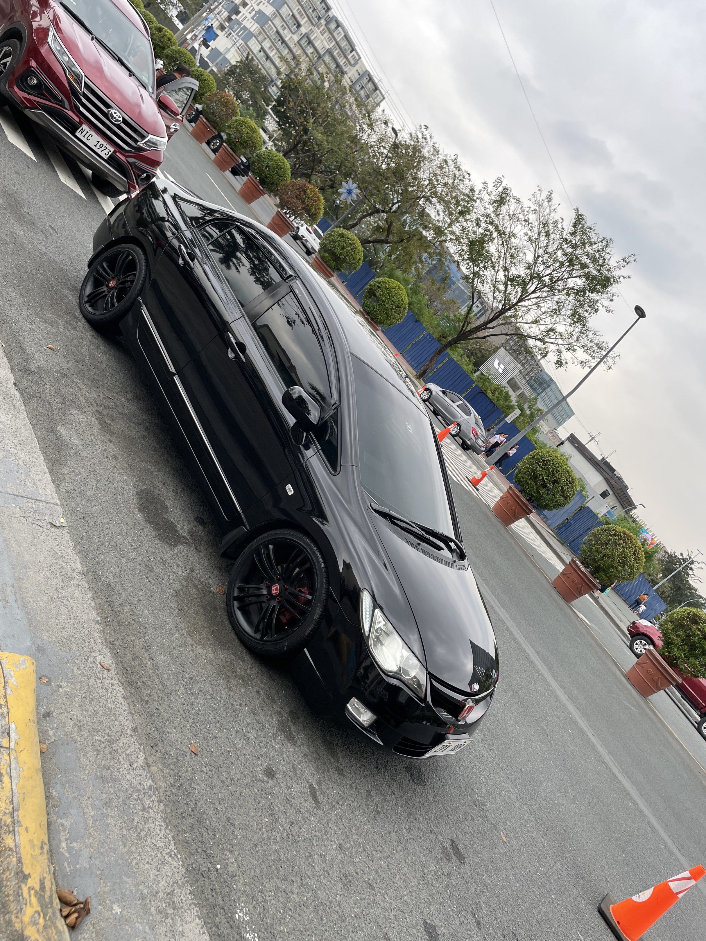 Honda Civic 1.8 VTI-S (A) (Category: Used Cars) located in Dasmarinas. Submitted by lotku2345 (Listing ID 1418166558, Image 2). Description: Honda civic 1.8s Nighthawk black HONDA CIVIC FD 1.8s 🖤🖤🖤🖤🖤🖤🖤 2008 model 1.8s Model (not V) matic NIGHTHAWK BLACK 69k odo (scan) No Error codes REGISTERED 2026 WHITE PLATE LTO ORIGINAL Fresh in N out Leather seat front and back 18INCH mags New tire unahan Aircon malamig pa sa ex mo 10inch android/ came