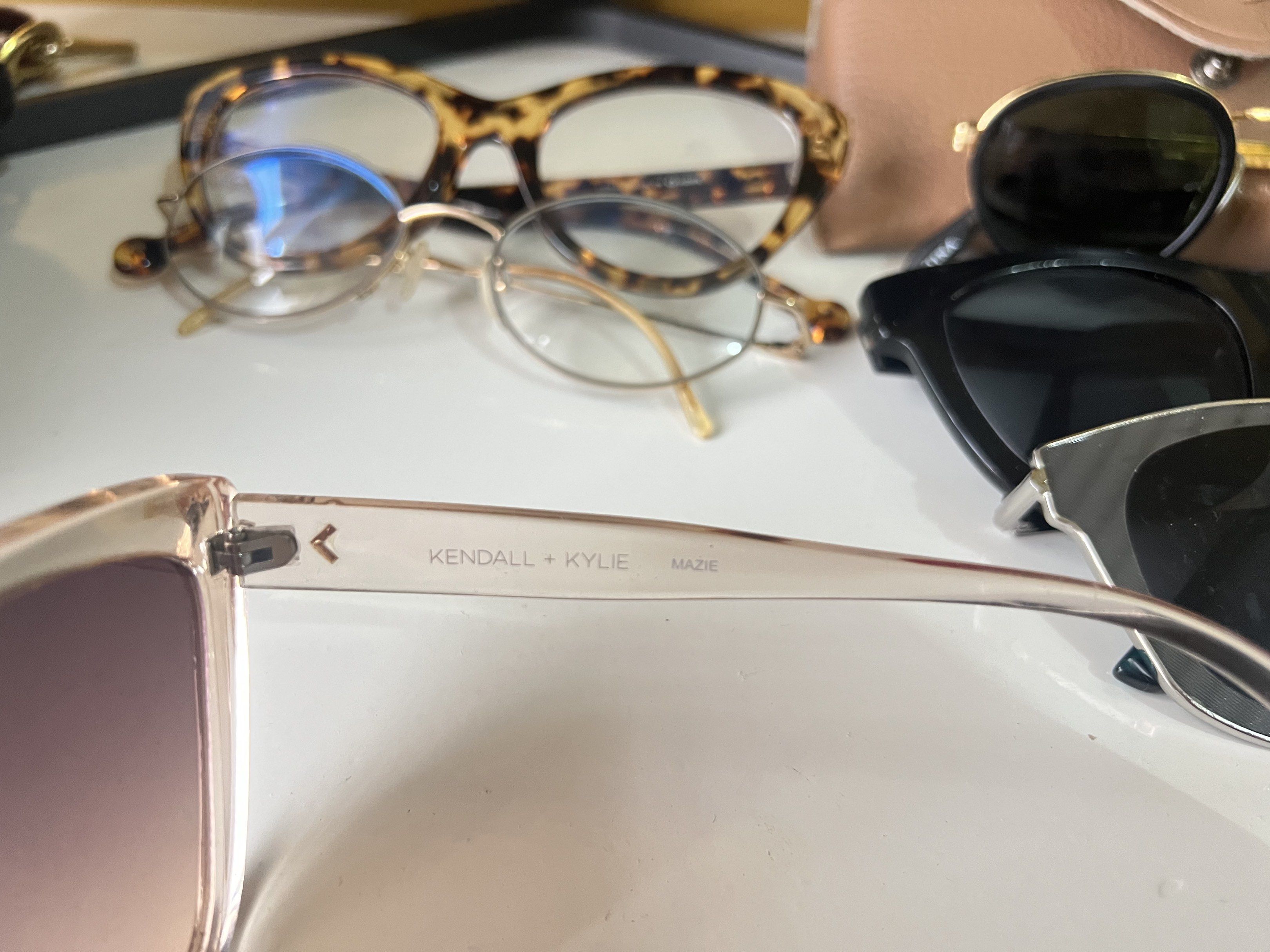 Kendall + Kylie Mazie Sunglasses (Category: Sunglasses & Eyewear) located in Quezon City. Submitted by bubspreloved (Listing ID 1418076894, Image 2). Description: - Kendall + Kylie Mazie sunglasses - Light brown frame - Gradient lenses - Modern square shape - Brand and model visible on arm - Great for sunny days.